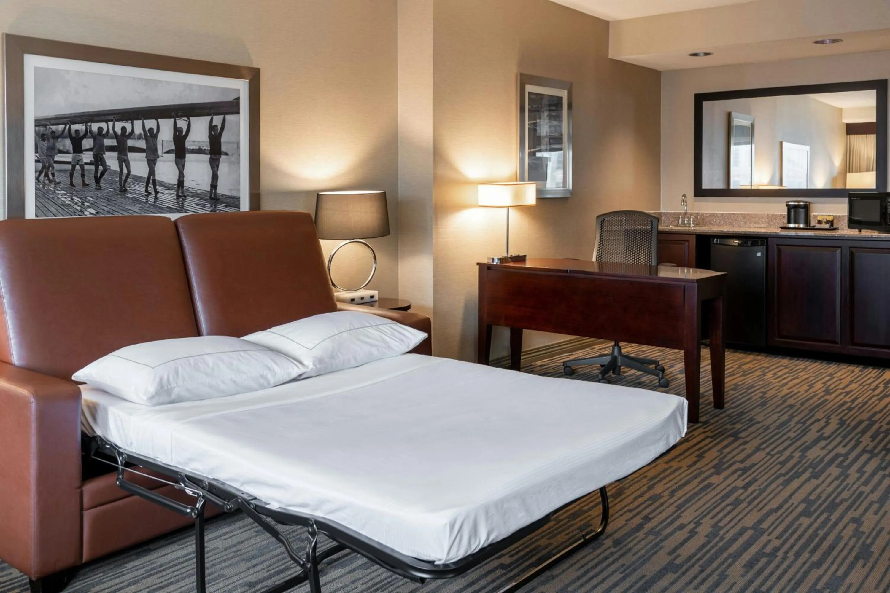 Photo of the whole room, Bed in The Capital Suites Hotel