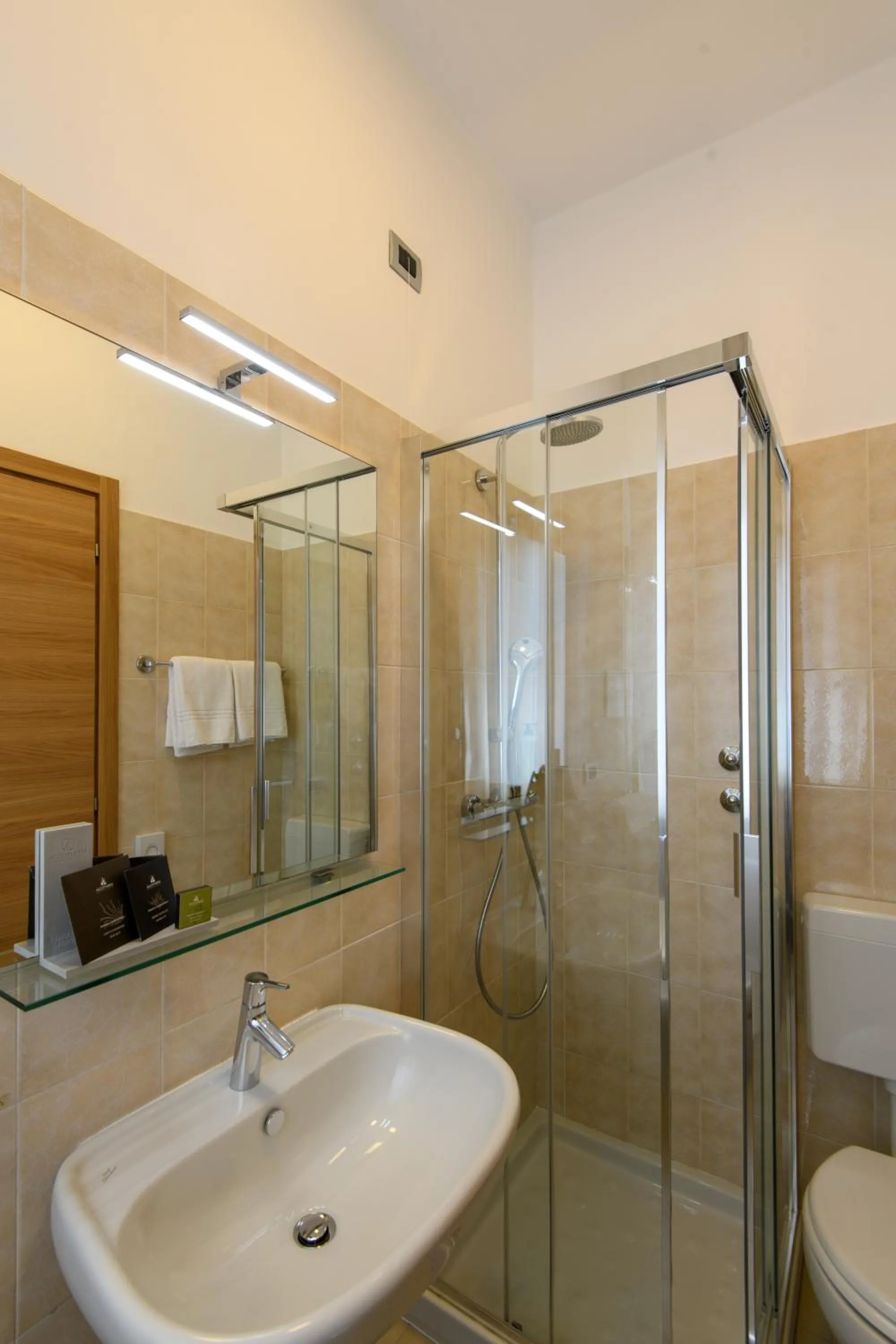 Bathroom in Hotel & Apartments Sasso