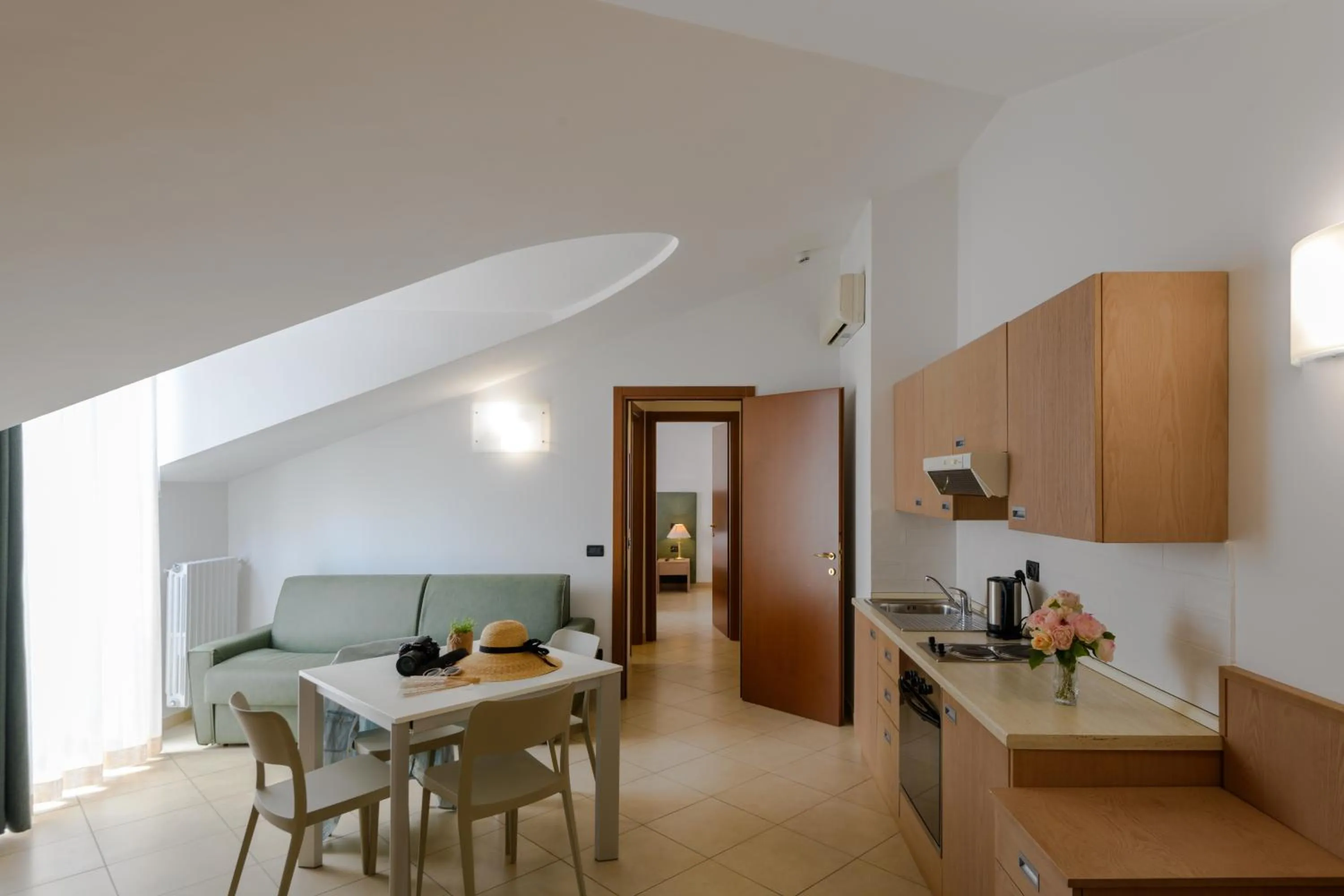 Kitchen or kitchenette in Hotel & Apartments Sasso