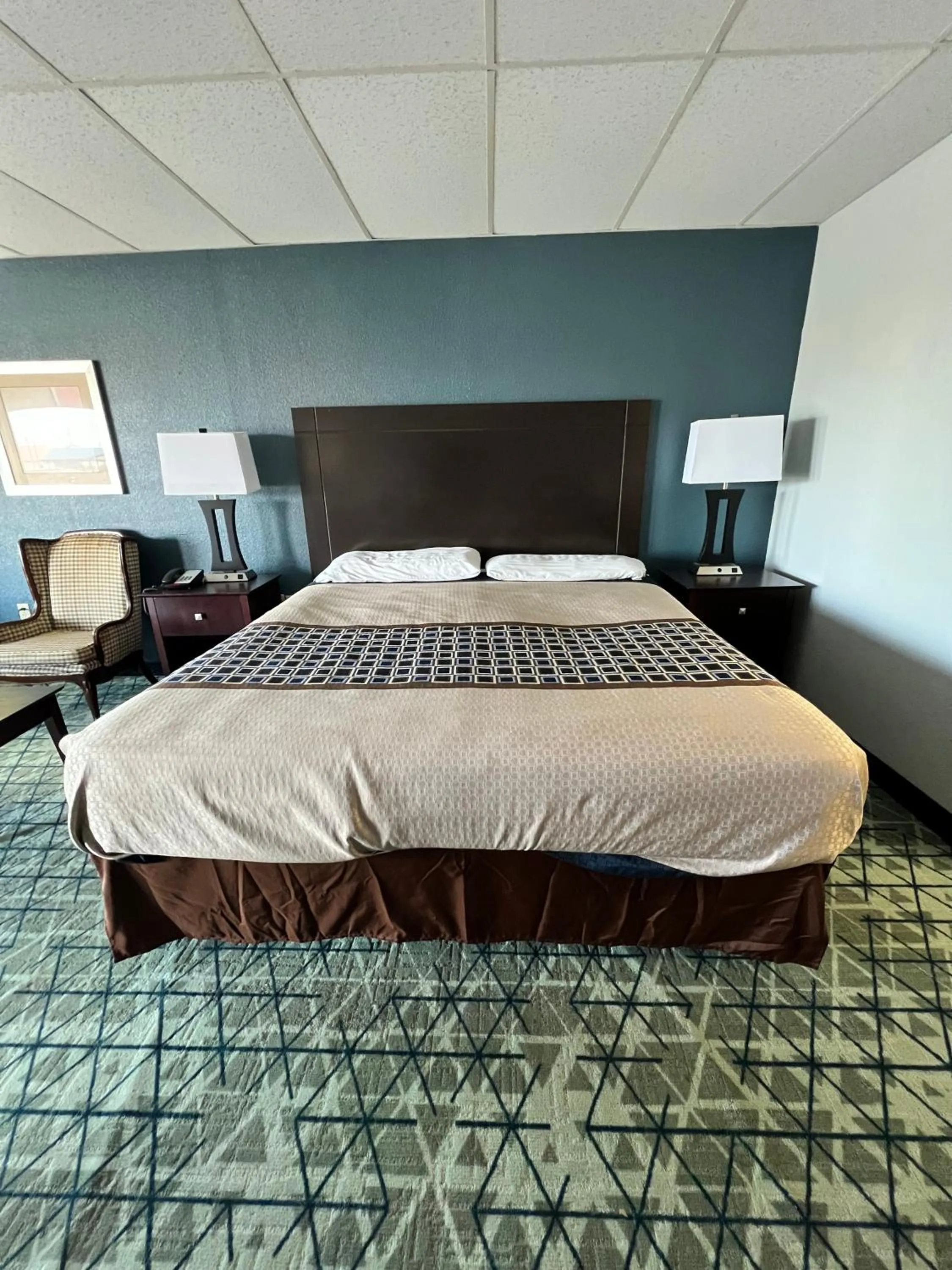 Bed in Executive Inn Texarkana