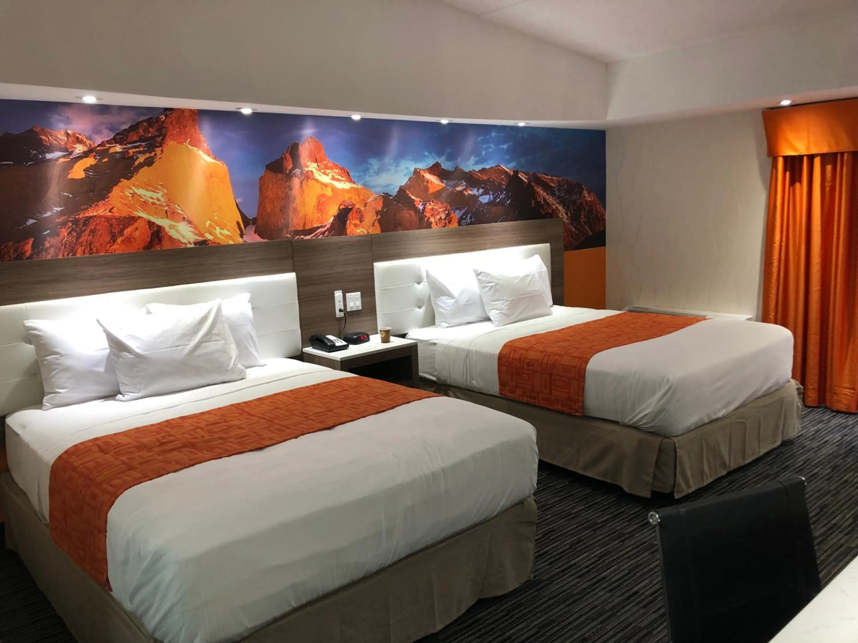 Bed in Howard Johnson by Wyndham Harrisburg