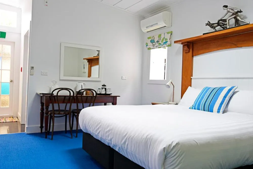 Bed in The Old Oak Boutique Hotel