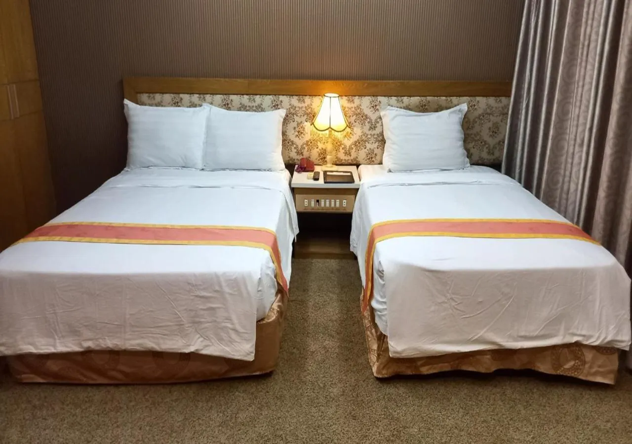 Bed in Khai Hoan Apartment Hotel