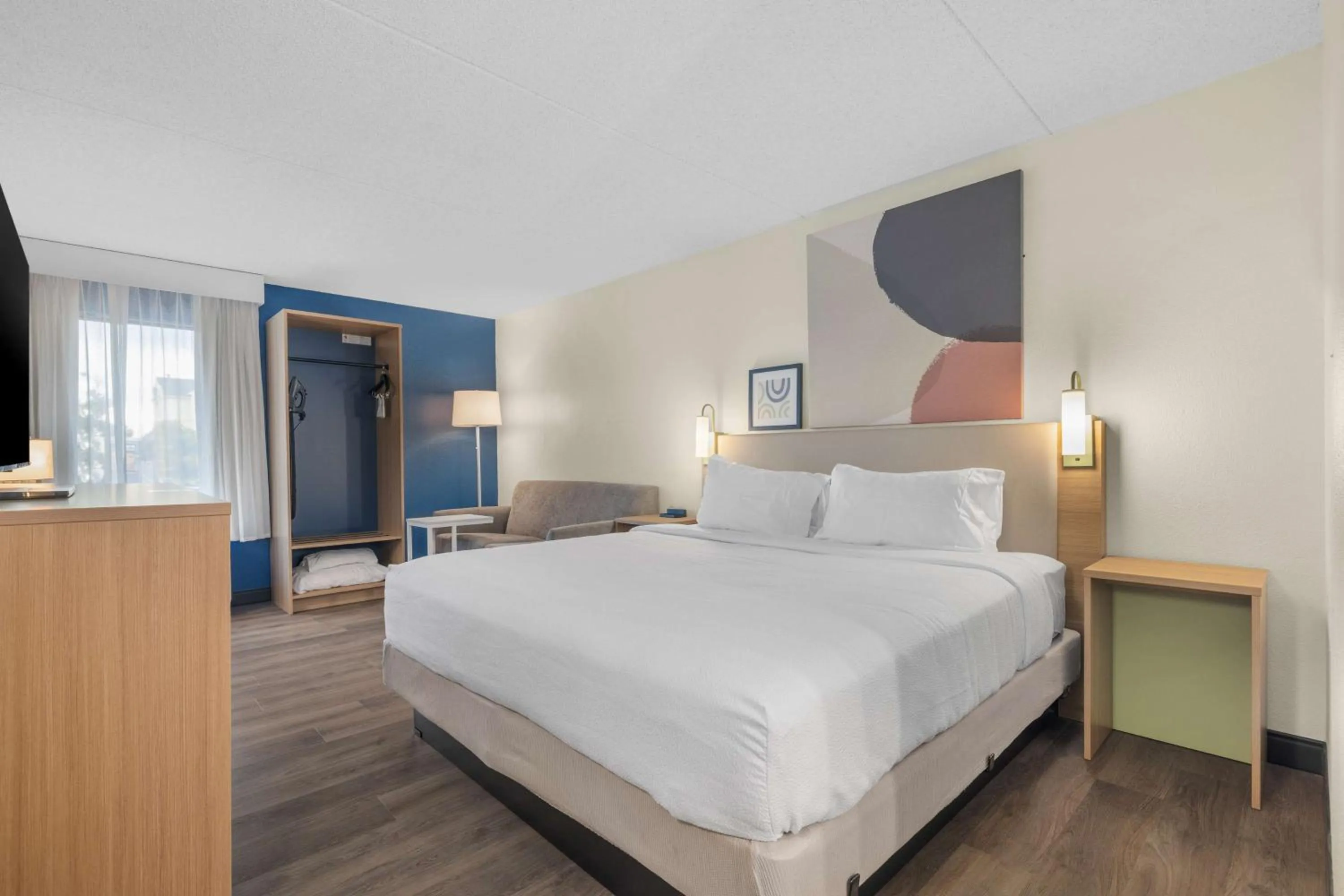 Living room, Bed in Spark by Hilton Colorado Springs I 25 Central