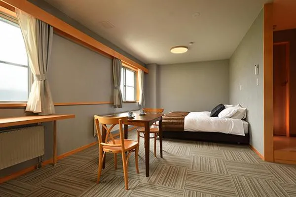 Bed in Hotel Takimoto