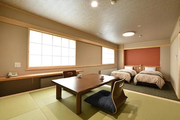 Bed in Hotel Takimoto