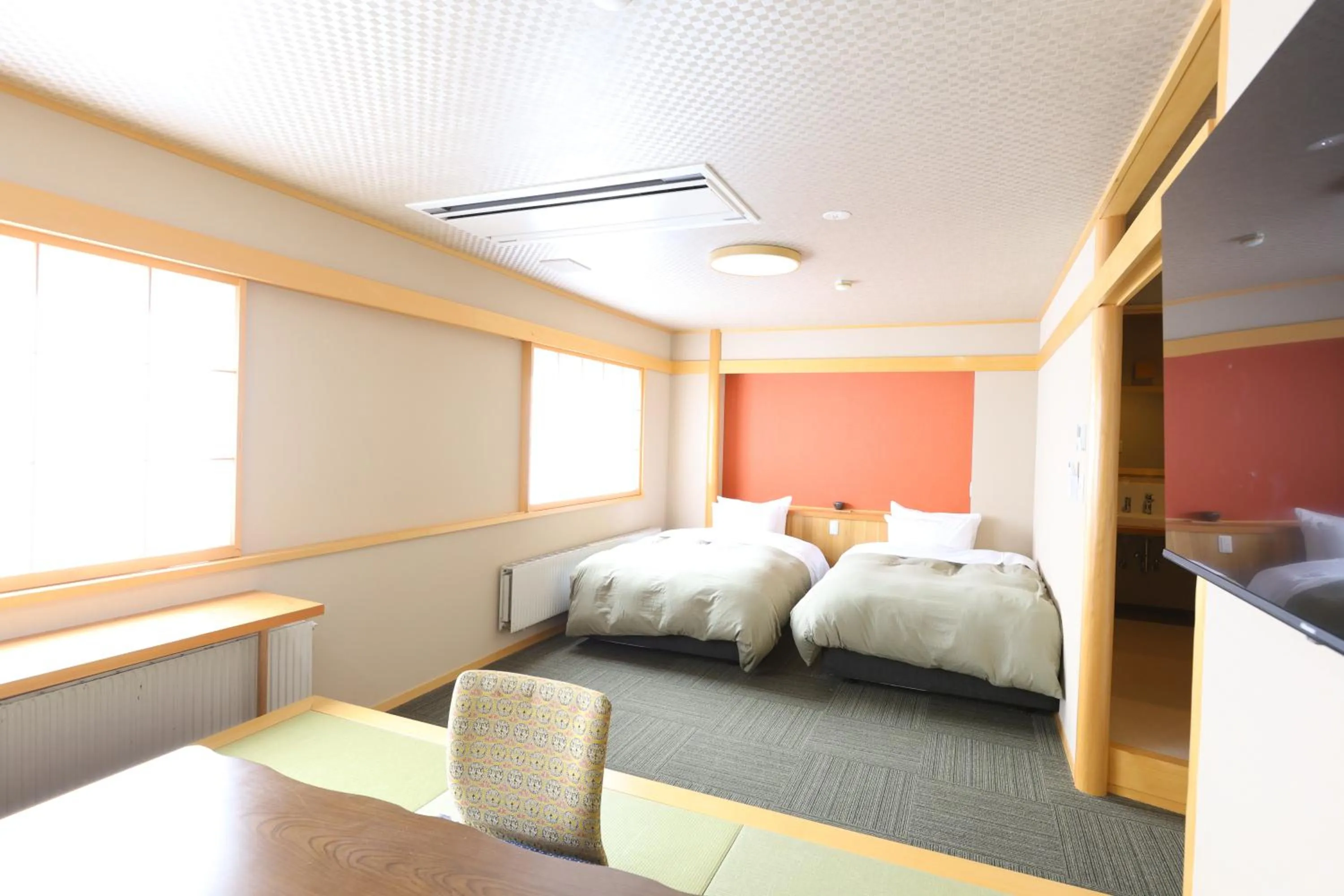 Bed in Hotel Takimoto