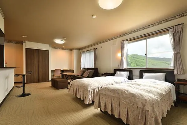 Bed in Hotel Takimoto