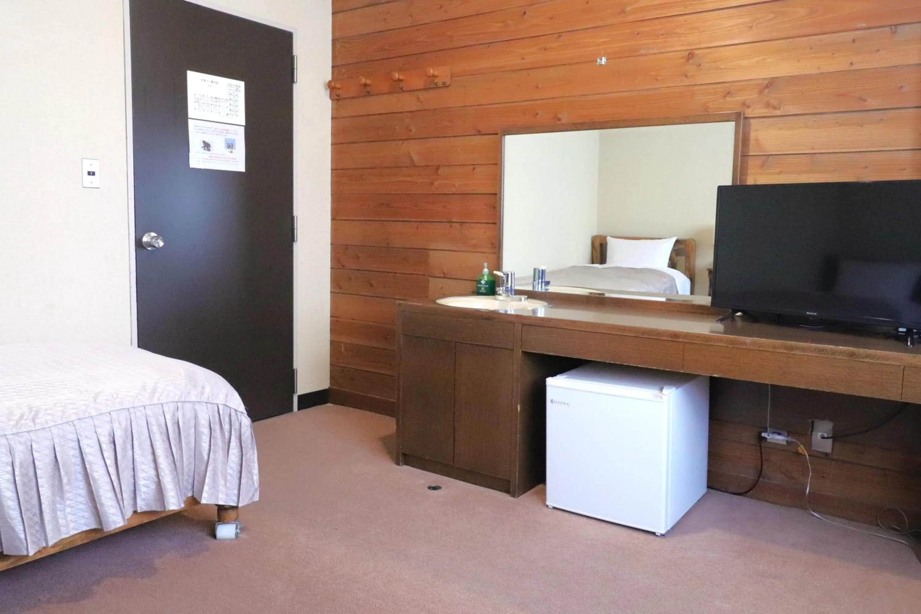 Bed in Hotel Takimoto