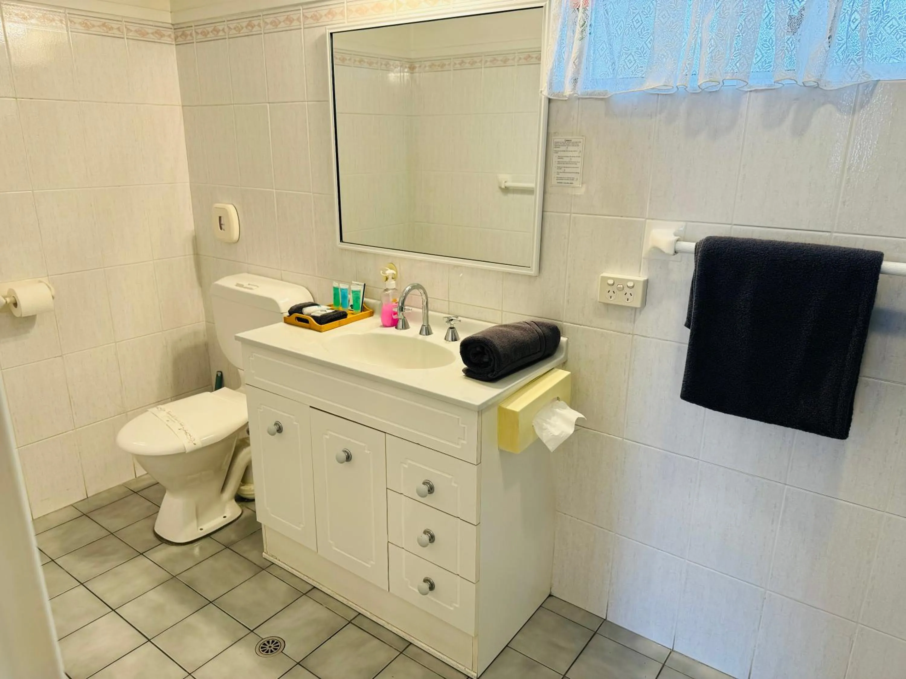 Bathroom in Town and Country Motor Inn