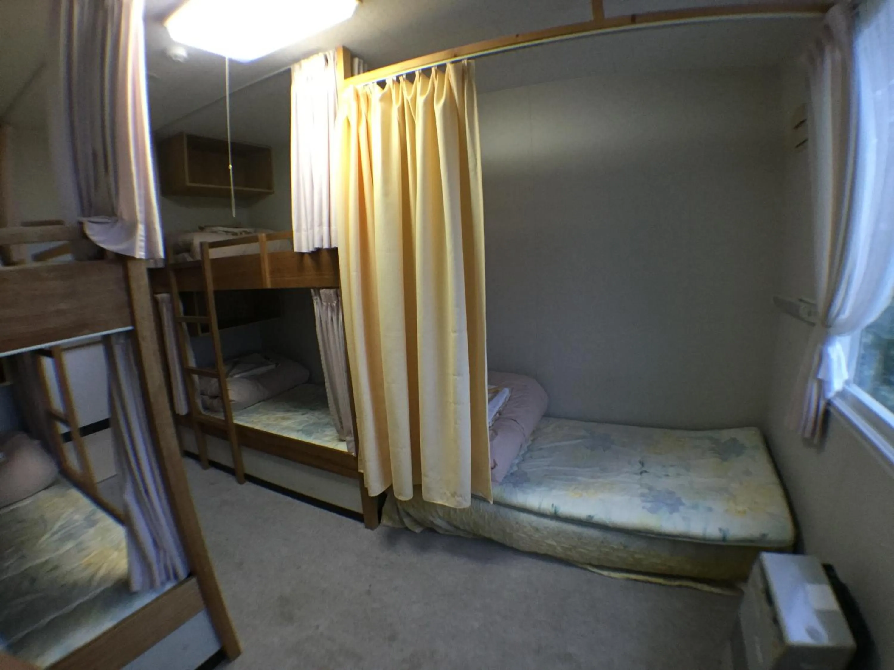 Bedroom, Bed in Abashiri Ryuhyou no Oka guesthouse