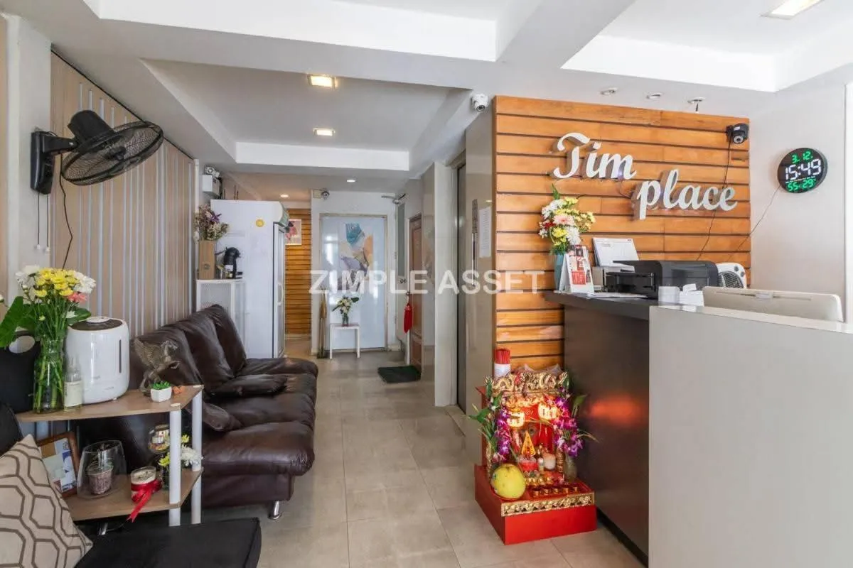 Text overlay in Tim Place - BTS Phra Khanong