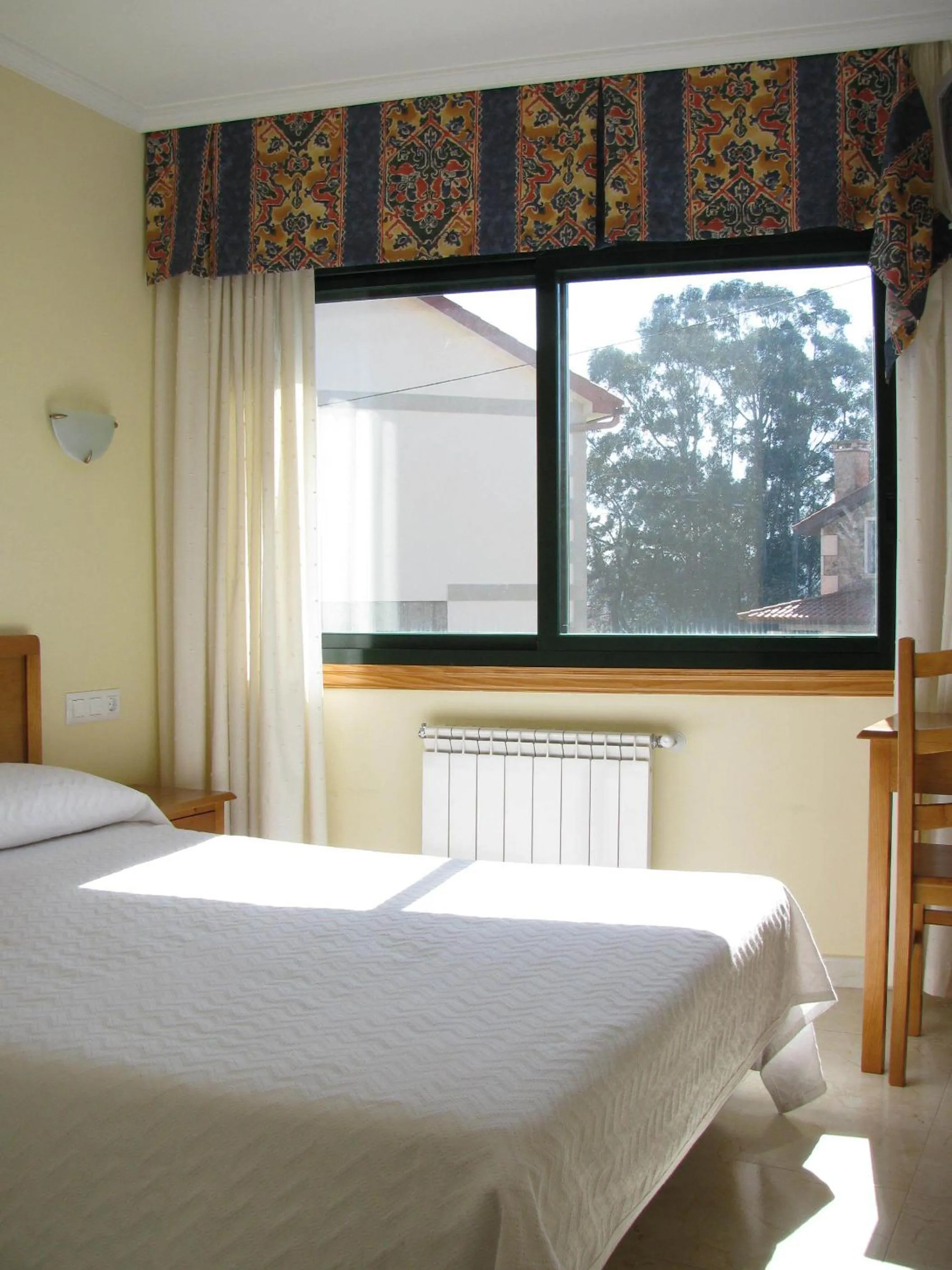 Photo of the whole room, Bed in Hotel Restaurante Los Tulipanes