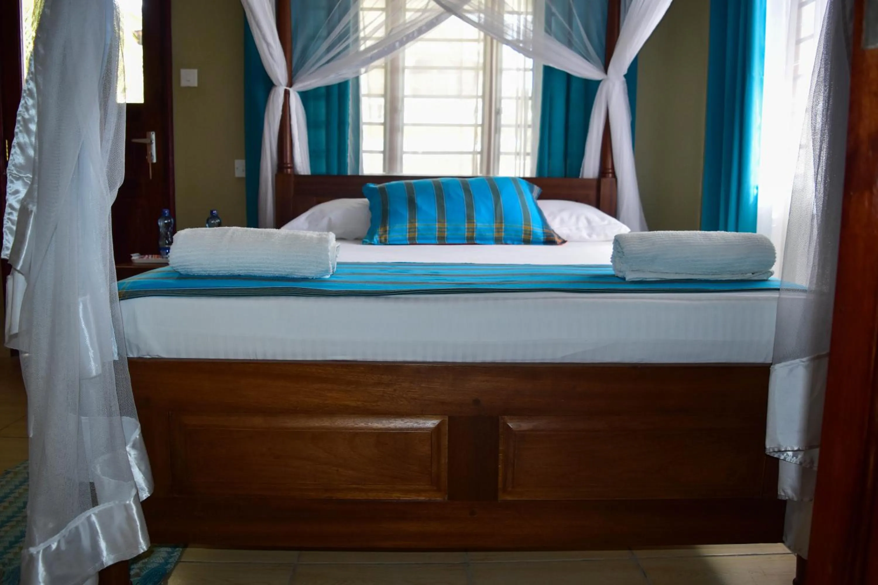 Bed in Tahira Villa