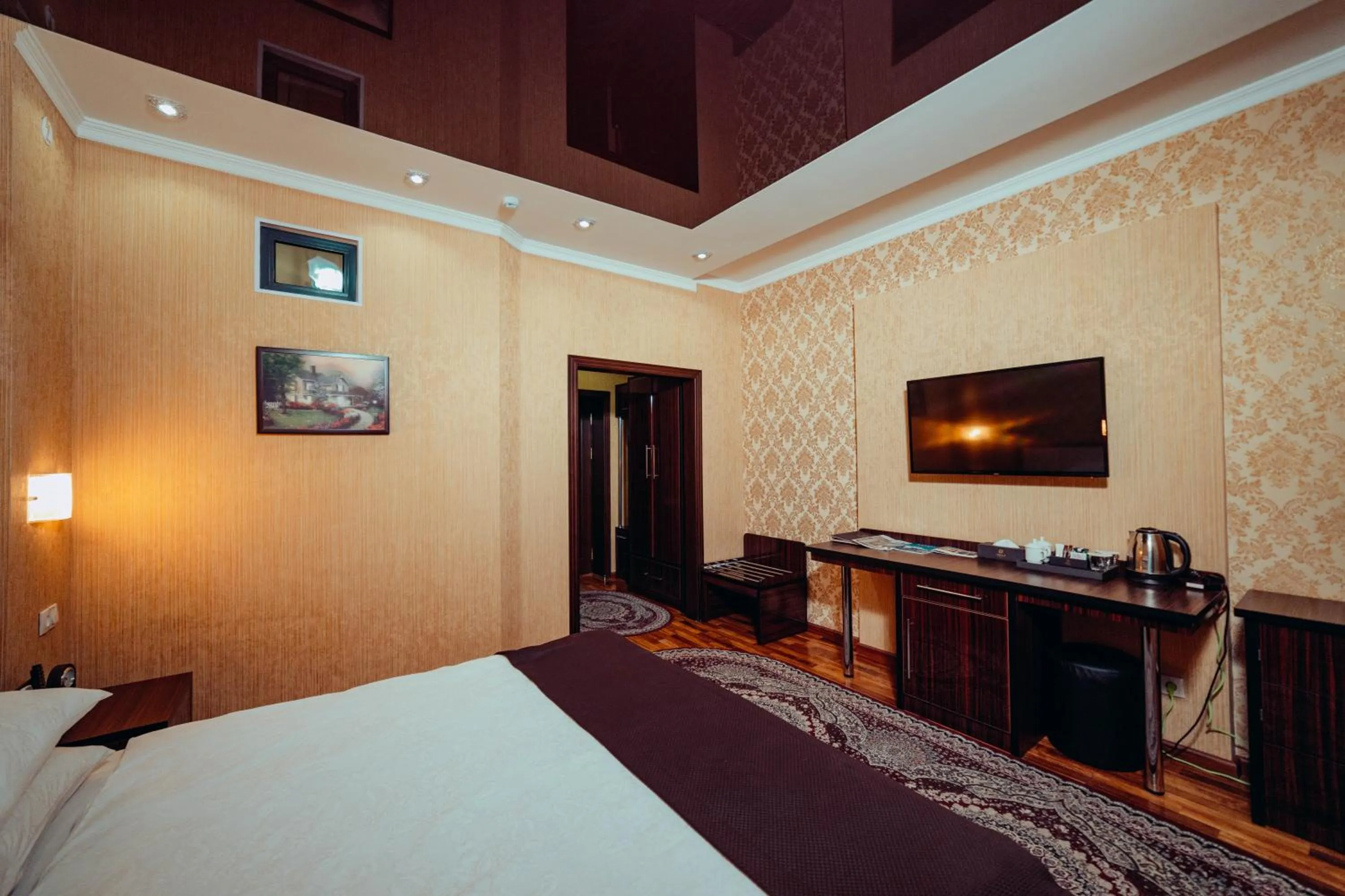 Bed in Asmald Palace Hotel