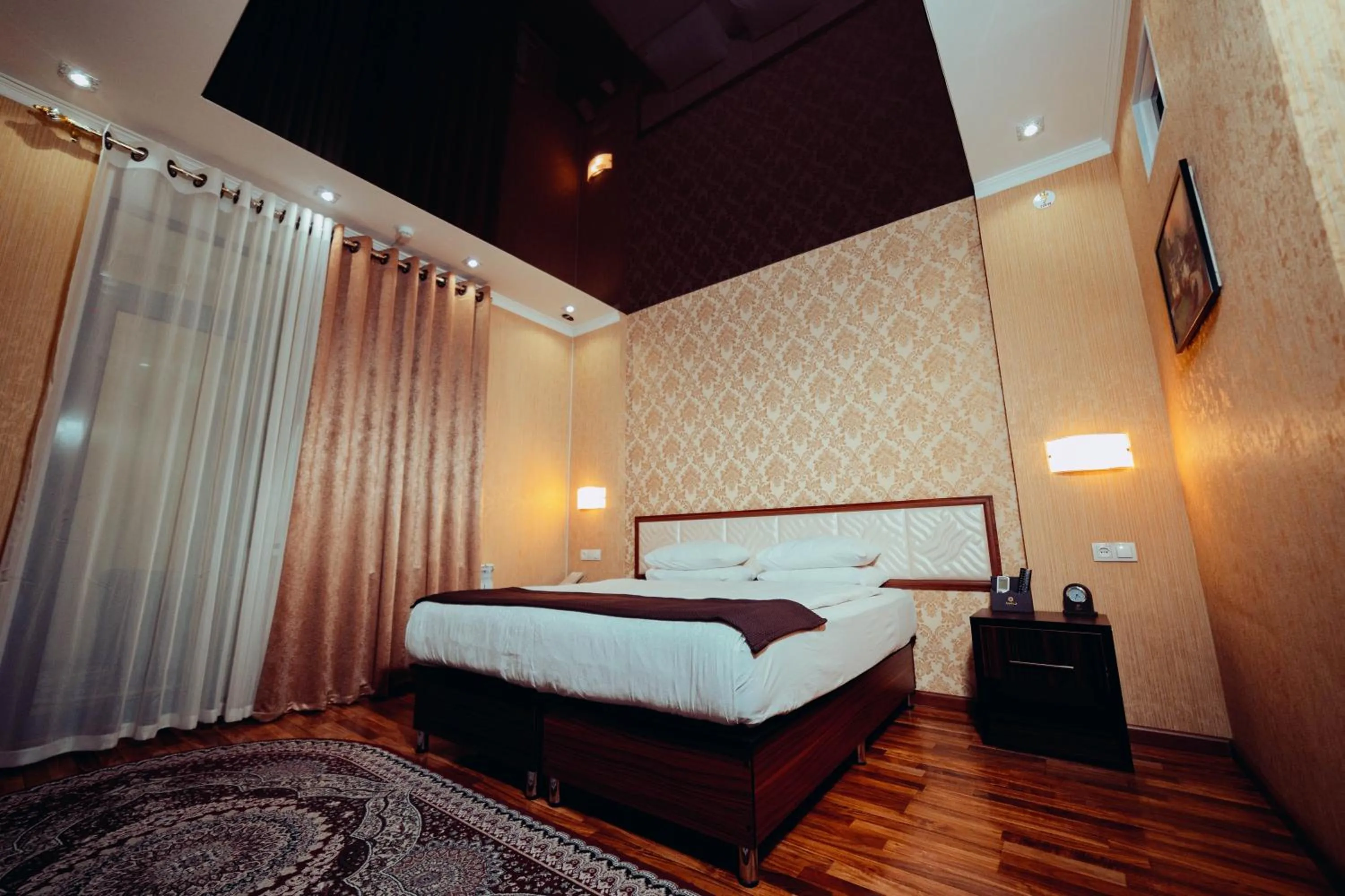 Bed in Asmald Palace Hotel