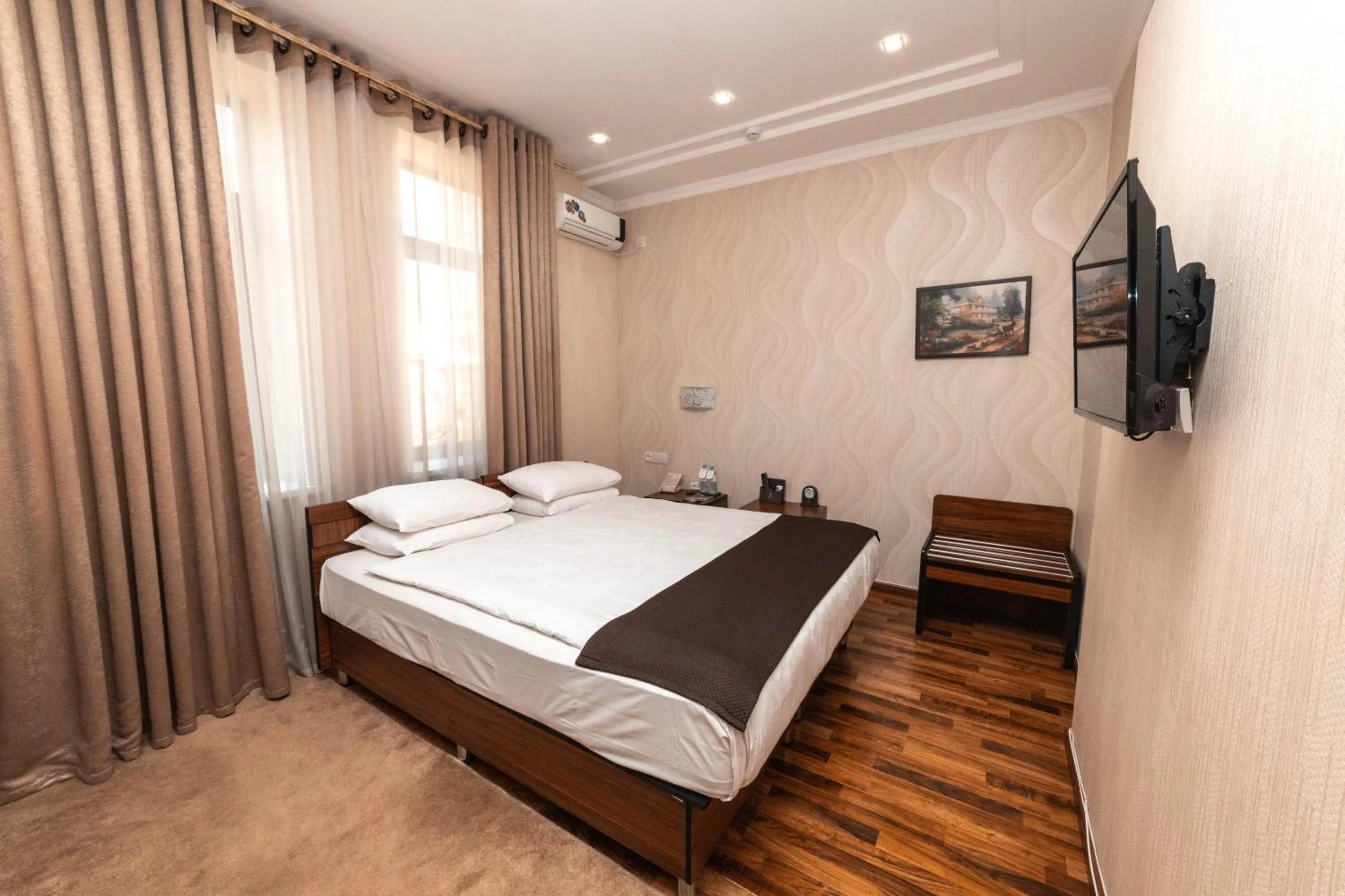 Bed in Asmald Palace Hotel