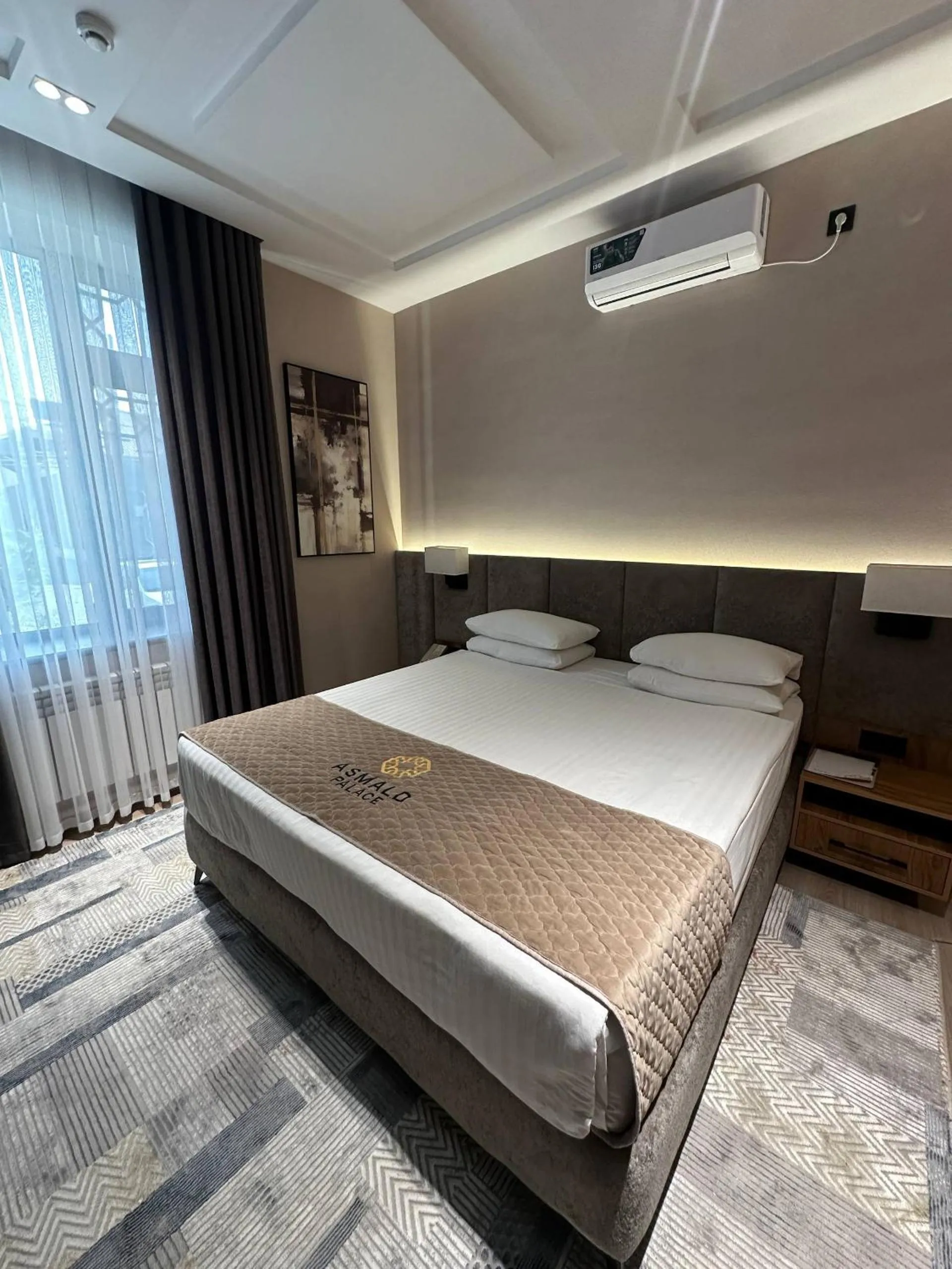 Bed in Asmald Palace Hotel