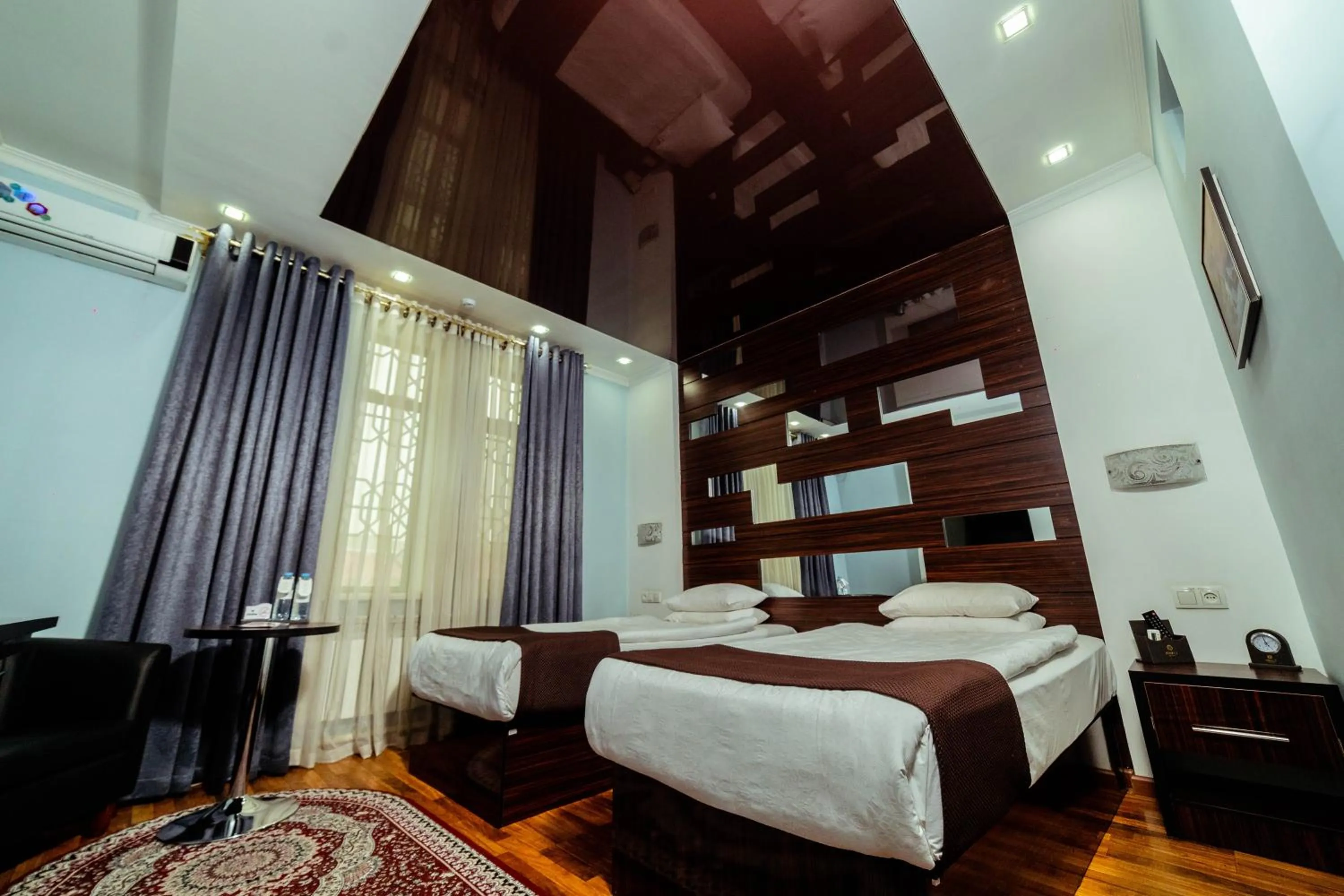 Bed in Asmald Palace Hotel