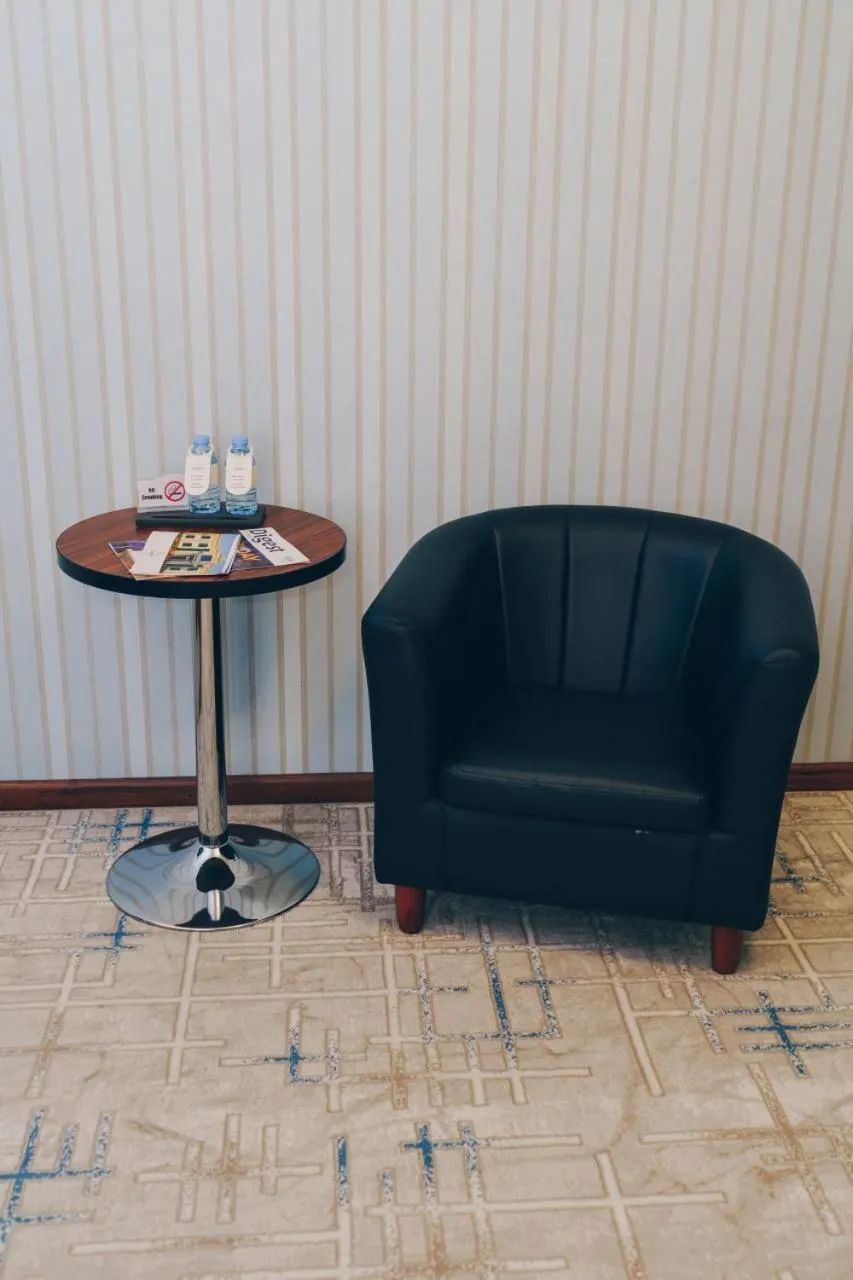 Living room in Asmald Palace Hotel
