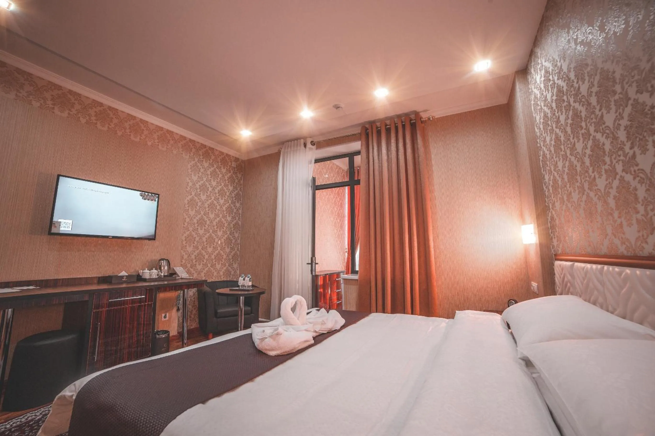 Bed in Asmald Palace Hotel