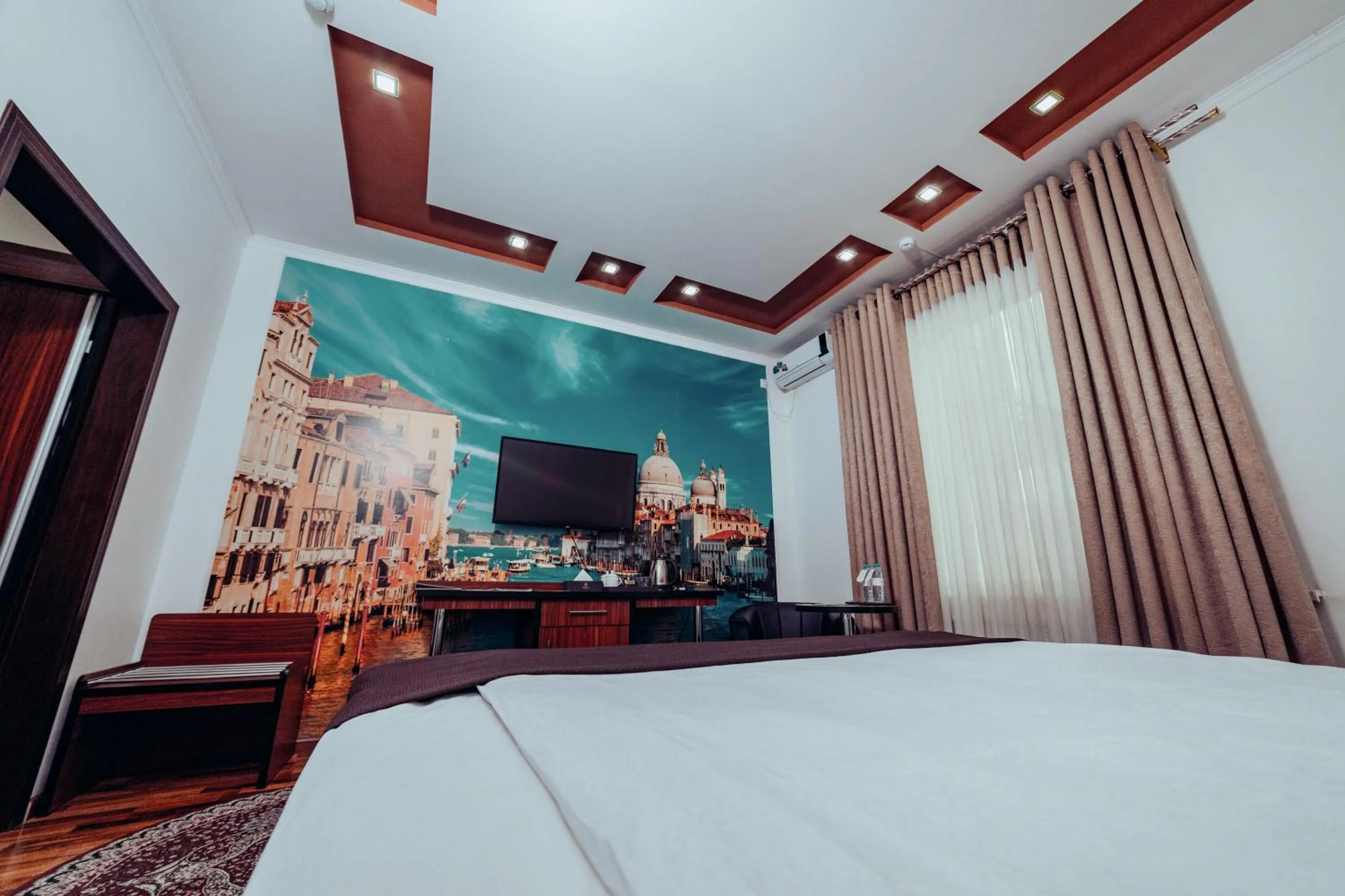 Bed in Asmald Palace Hotel