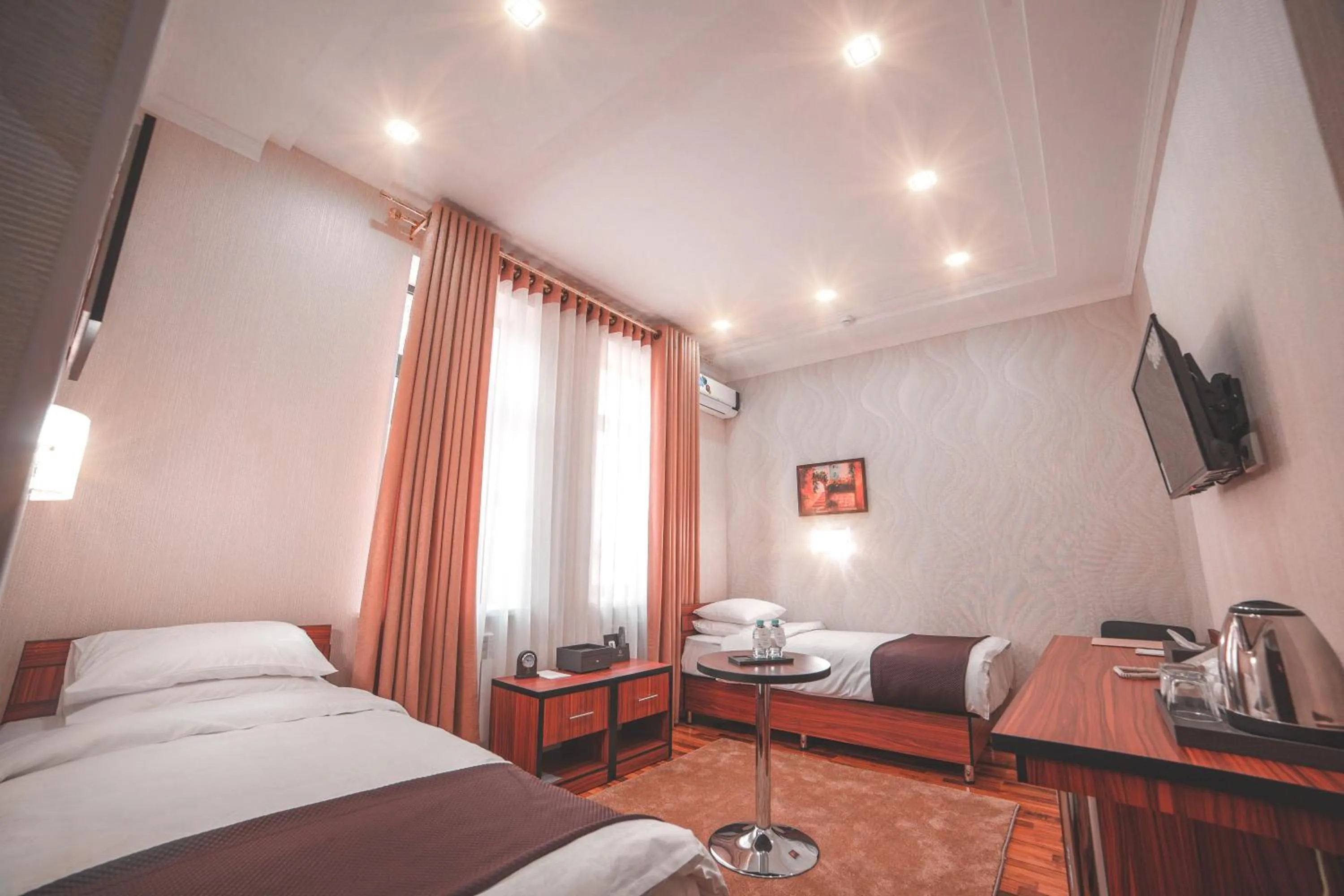 Bed in Asmald Palace Hotel