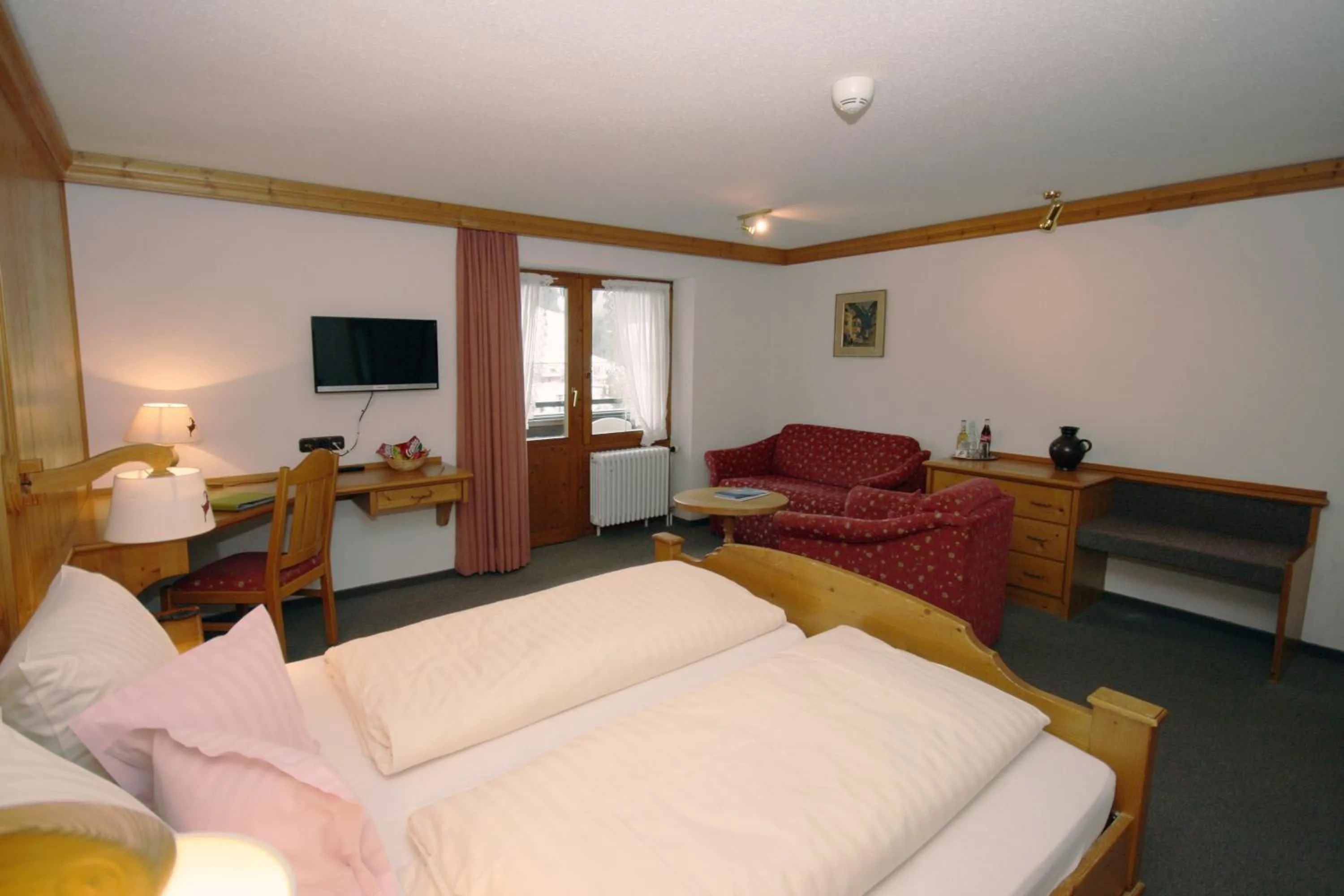 Photo of the whole room, Bed in Hotel Alpensonne