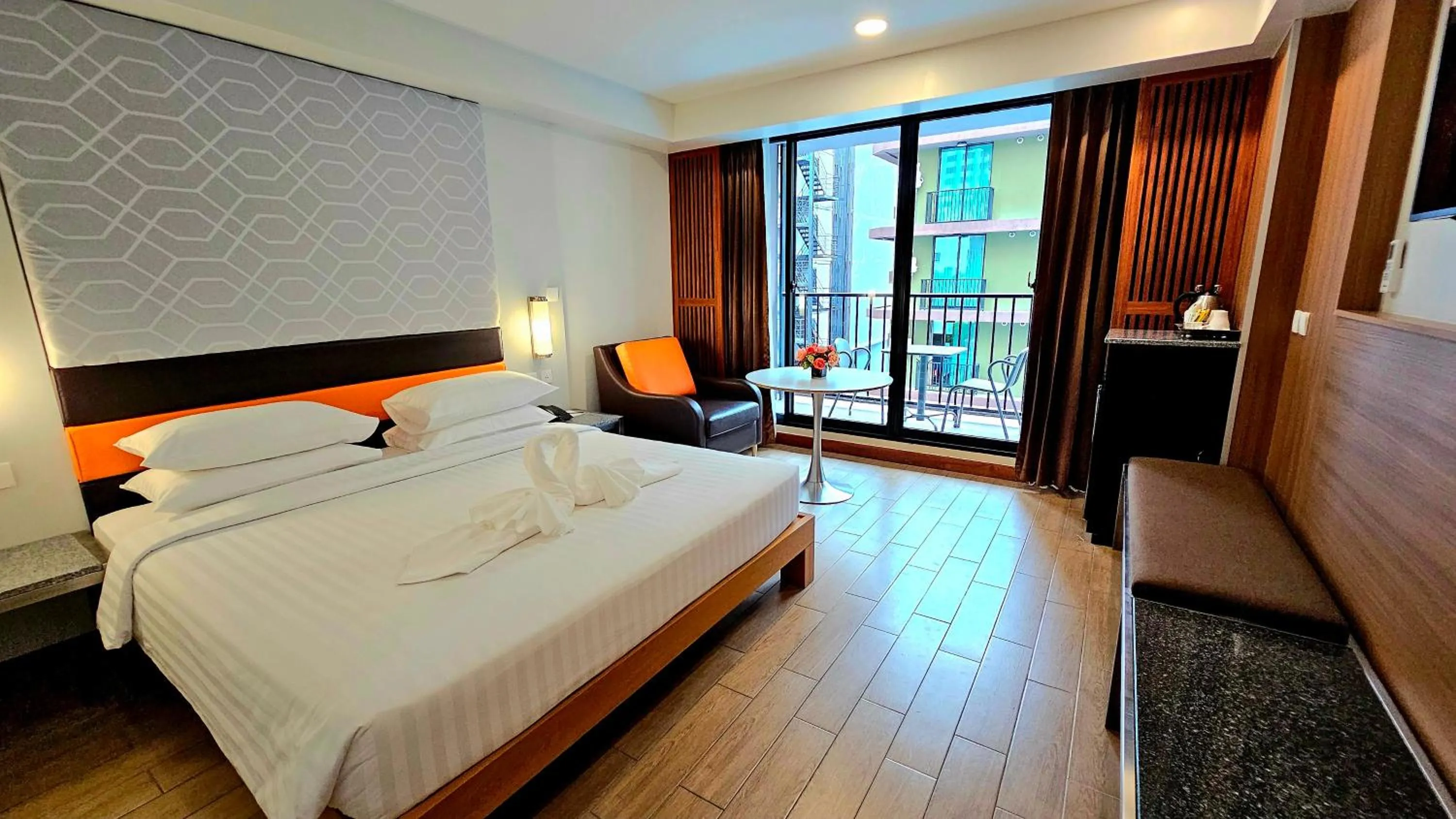 Bed in Dynasty Grande Hotel