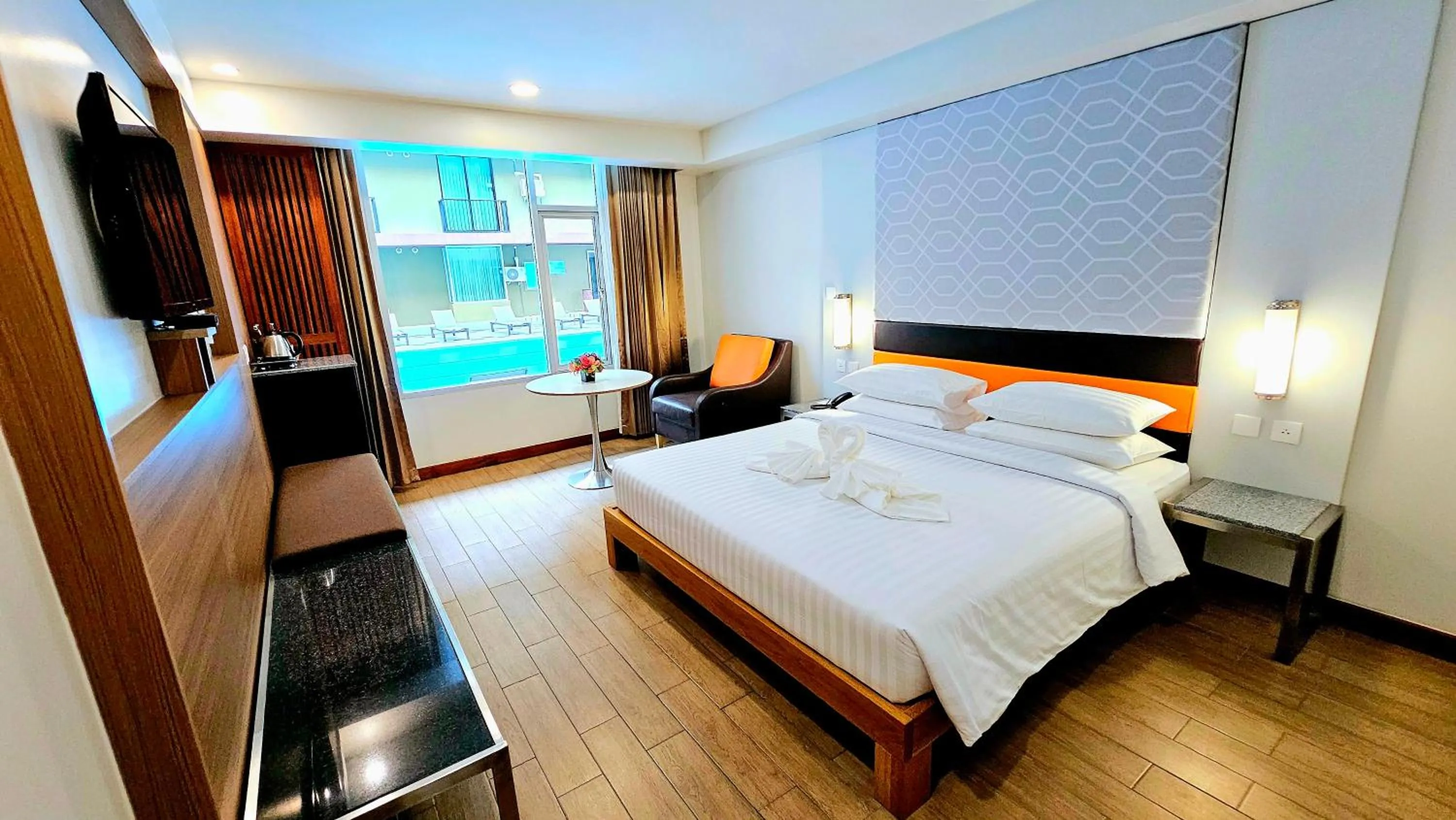 Bed in Dynasty Grande Hotel