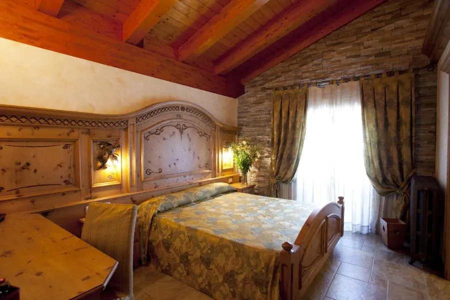 Bed in Hotel Le Ortensie