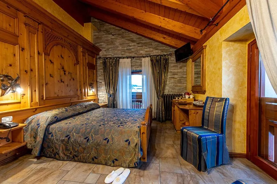 Bed in Hotel Le Ortensie