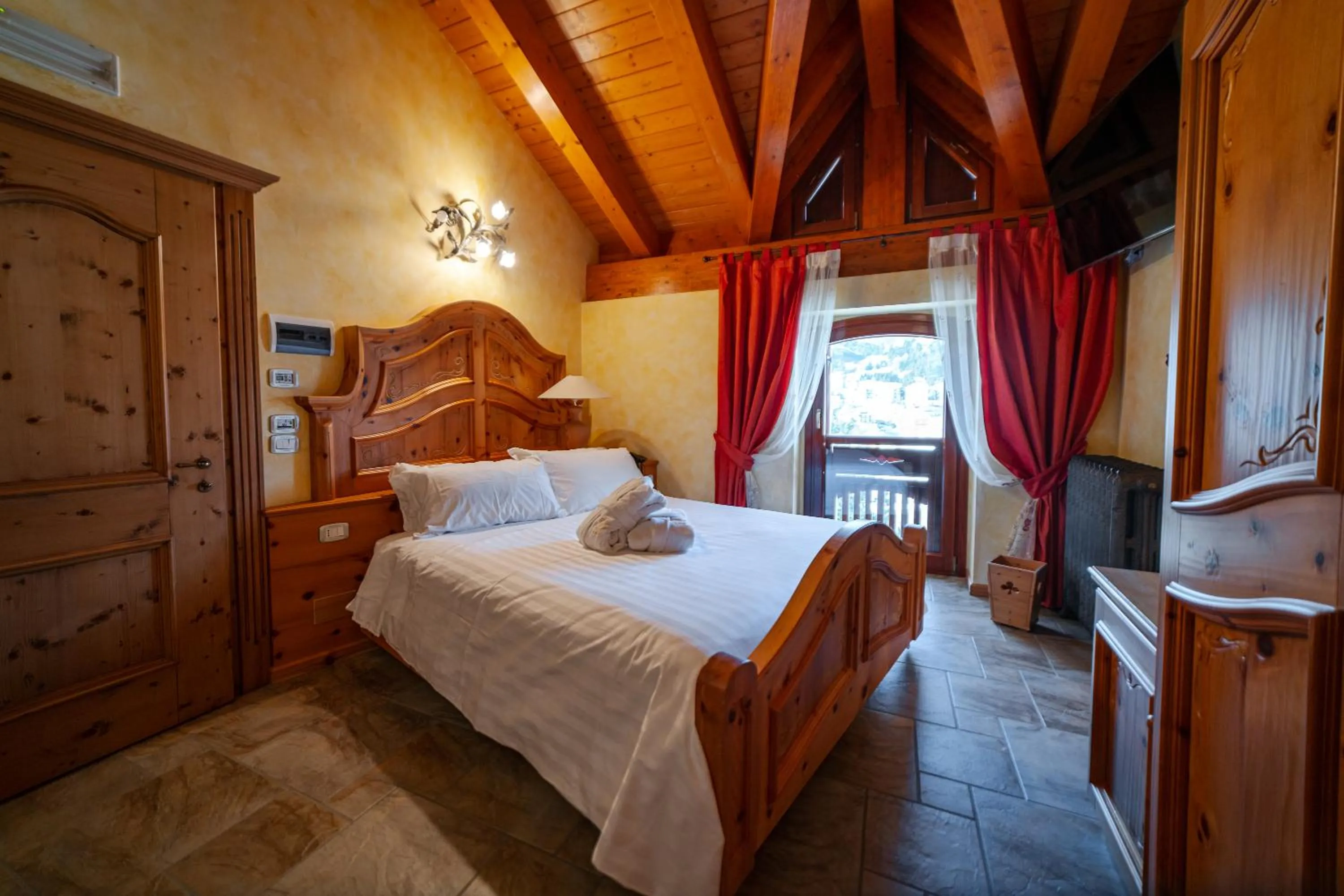 Bed in Hotel Le Ortensie