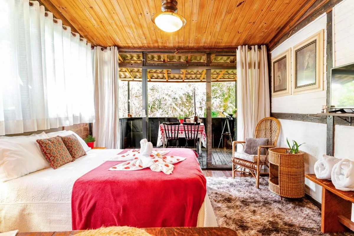 Bed in Chalé Rustic House