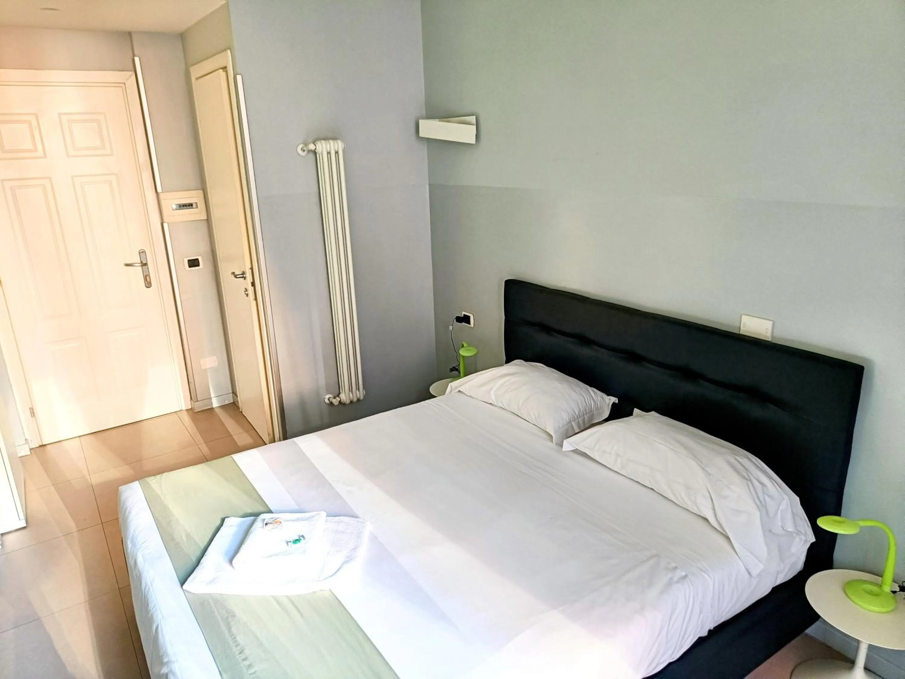 Photo of the whole room, Bed in Manin Suites LT