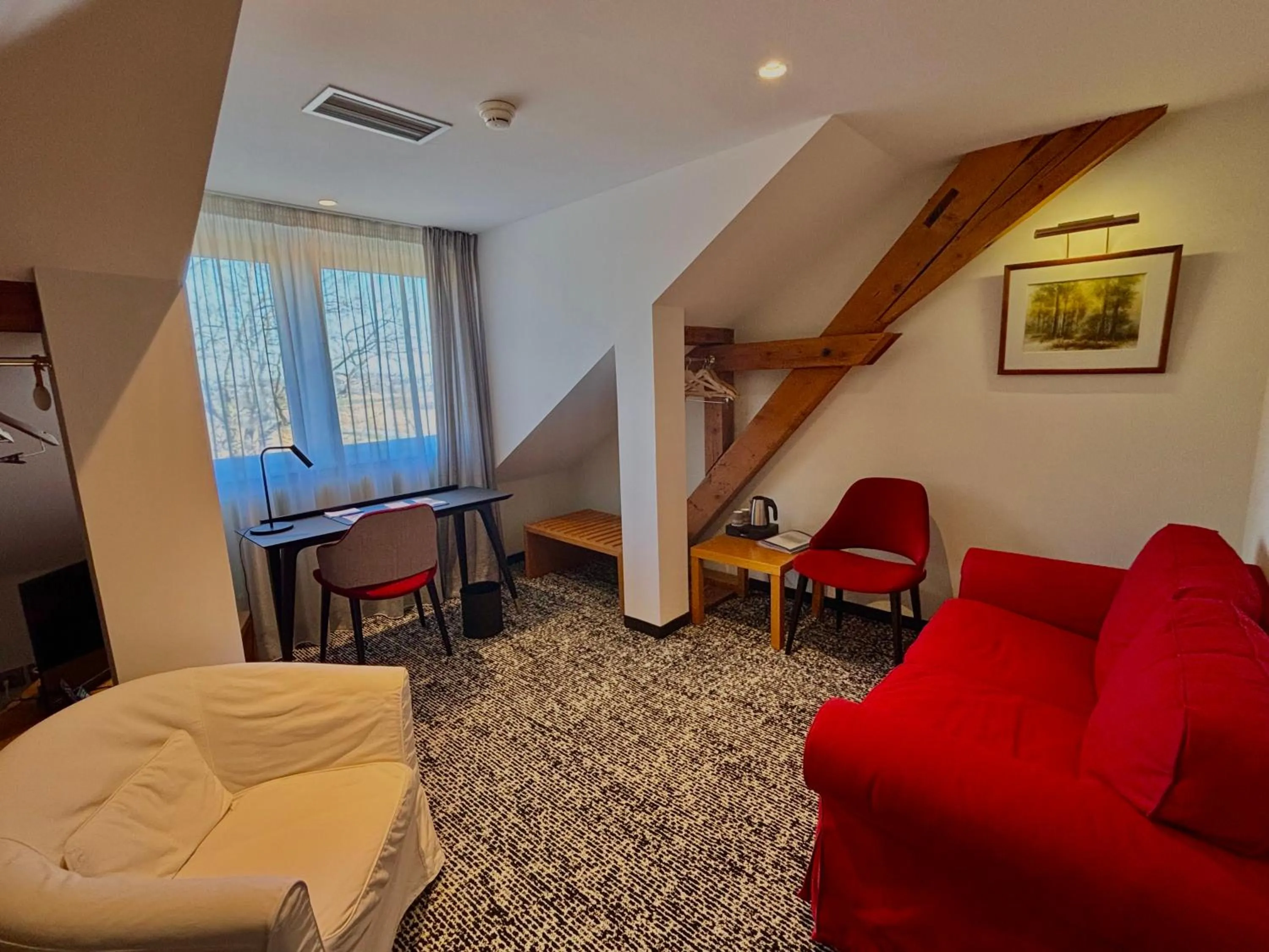 Seating area in Hôtel Restaurant Logis Auberge Sundgovienne