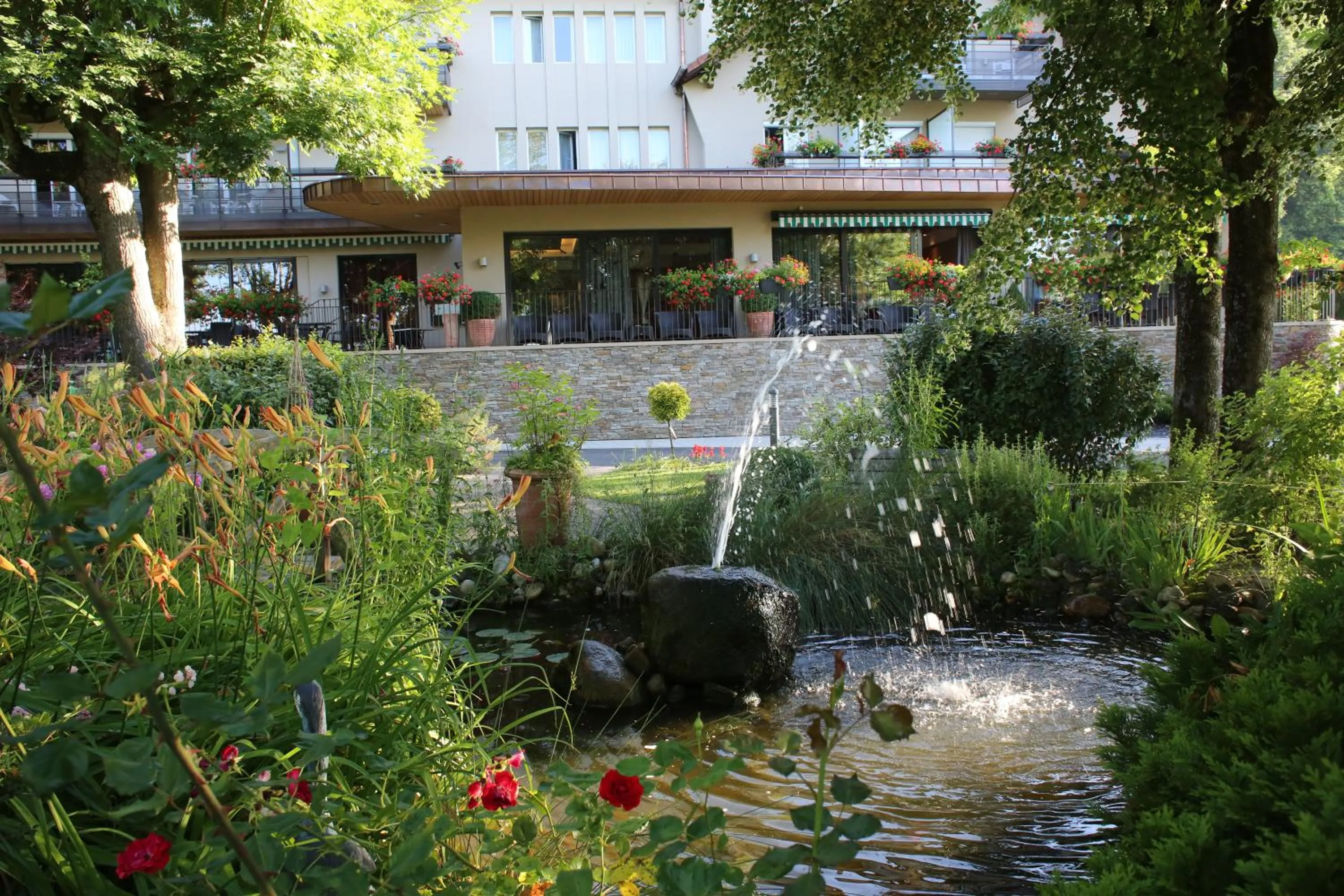 Garden in Hôtel Restaurant Logis Auberge Sundgovienne