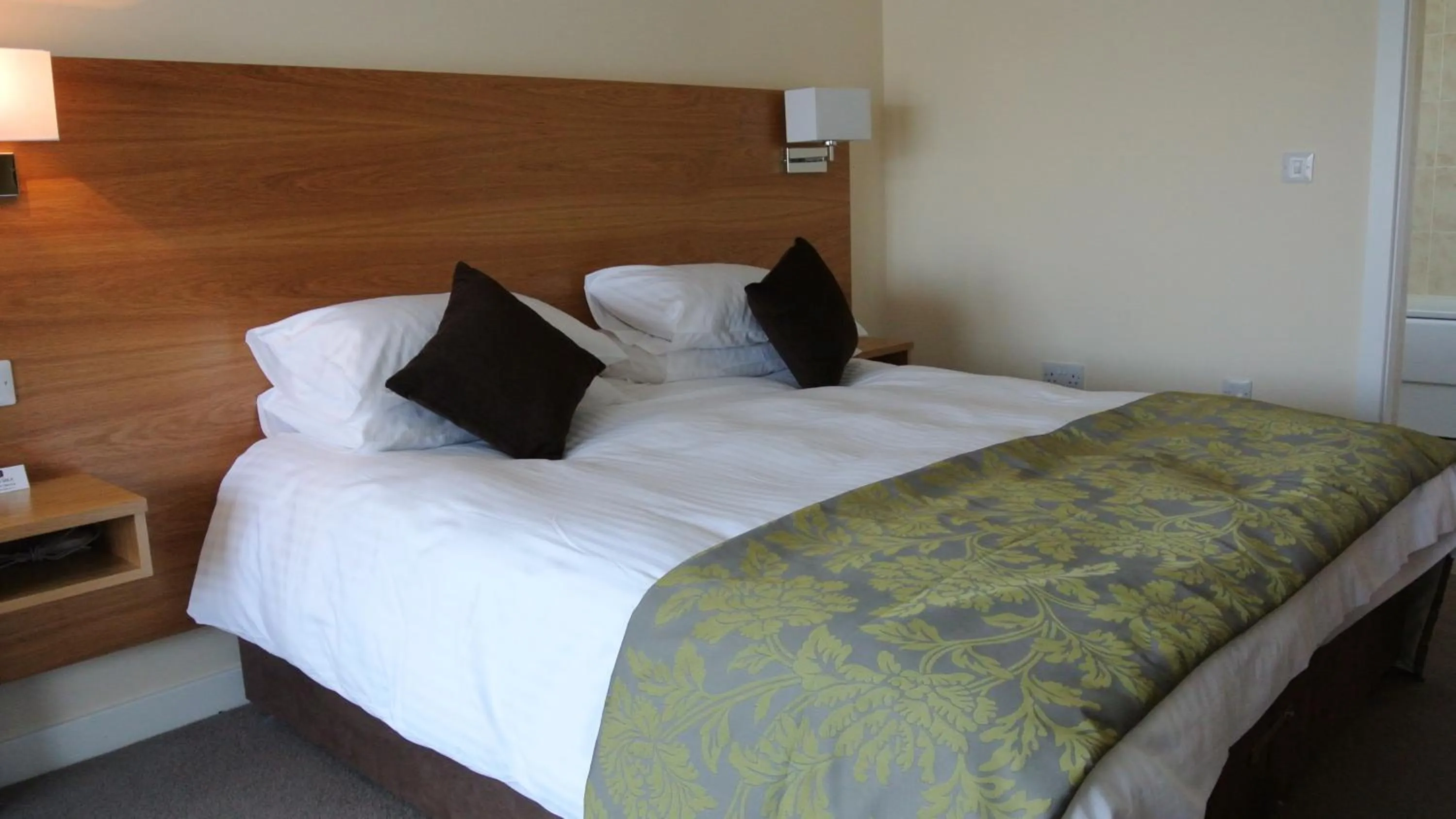 Bed in Ramsey Park Hotel