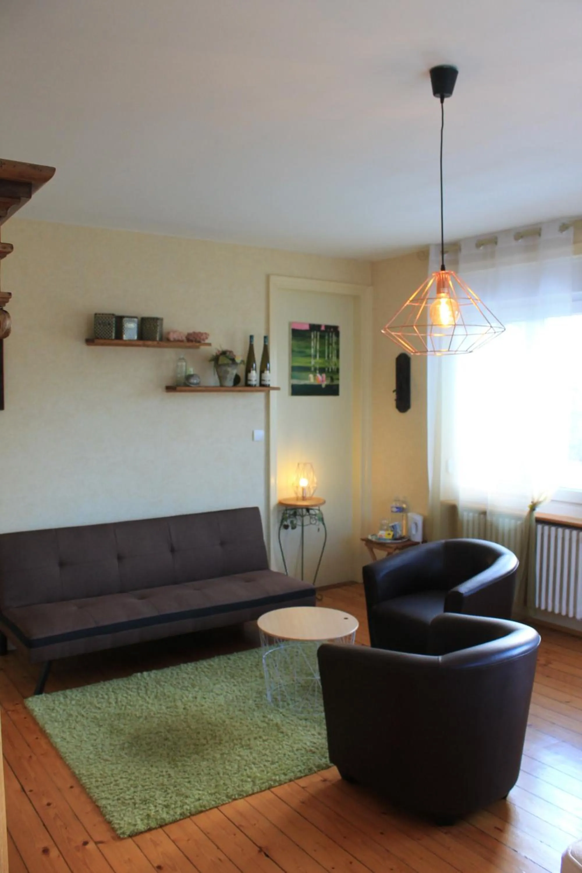 Seating area in Aux Berges de la Thur