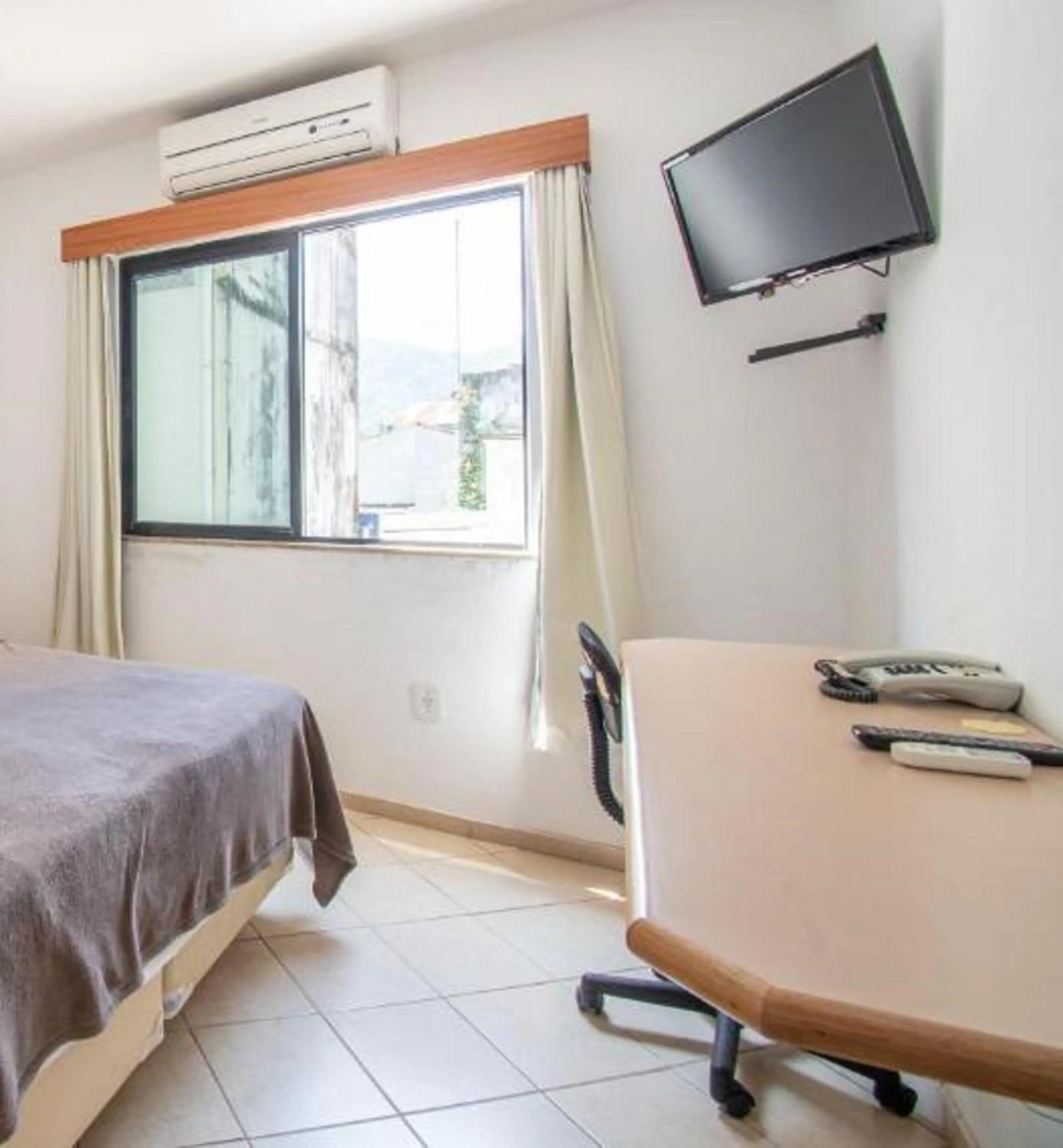 Bedroom, Bed in OYO Residencial Itacuruçá Apart Hotel, Mangaratiba