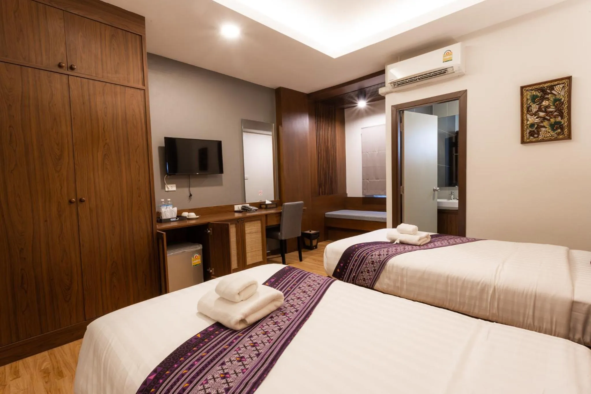 Bed in Lima Lanna Hotel