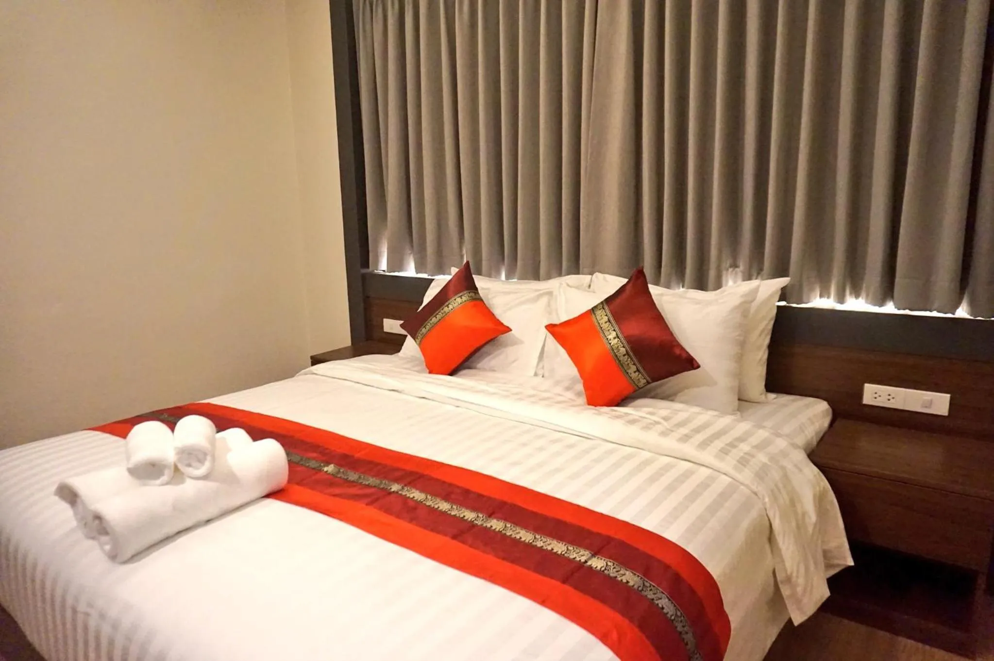 Bed in Lima Lanna Hotel