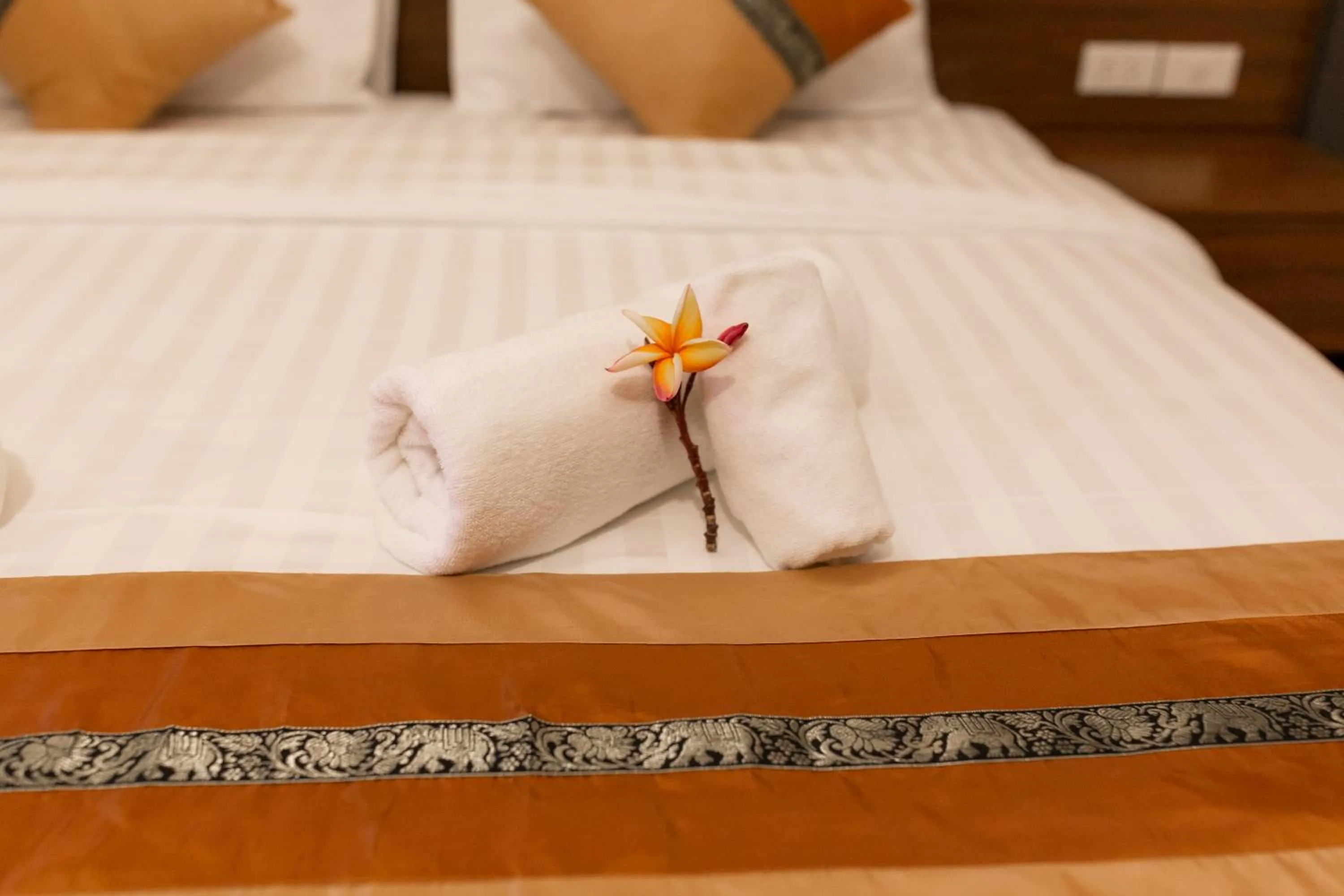 Bed in Lima Lanna Hotel