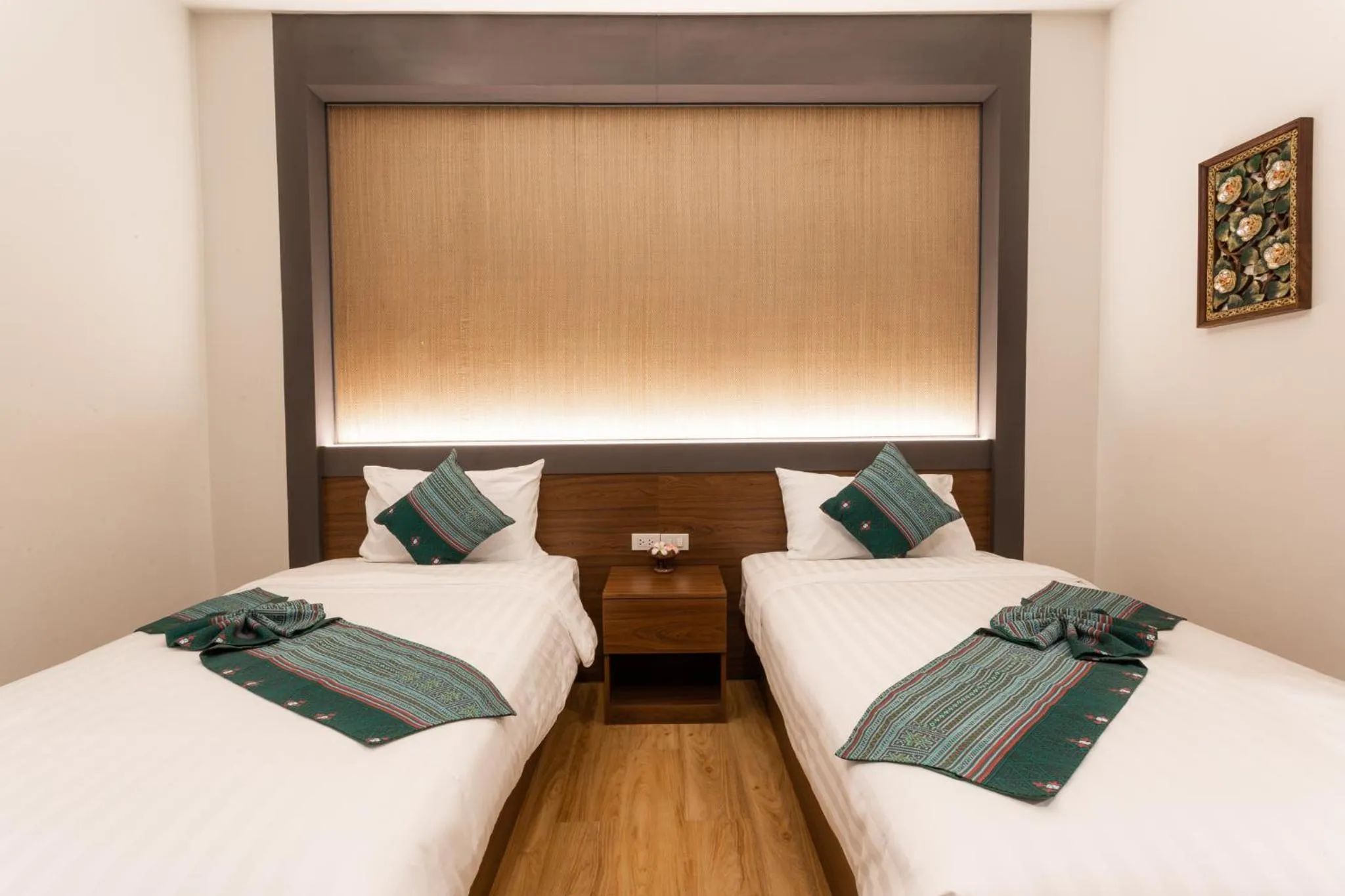 Bed in Lima Lanna Hotel