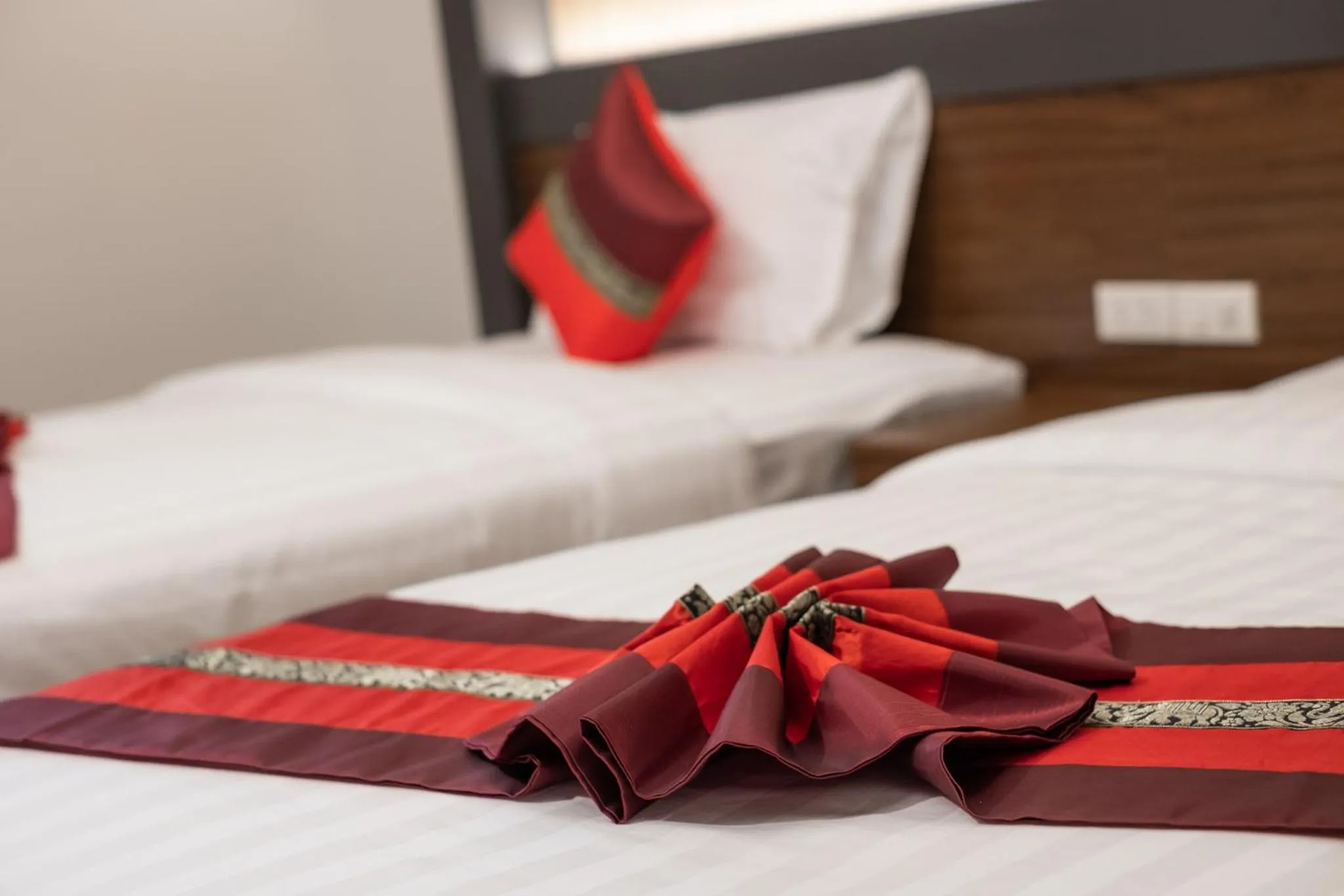 Bed in Lima Lanna Hotel