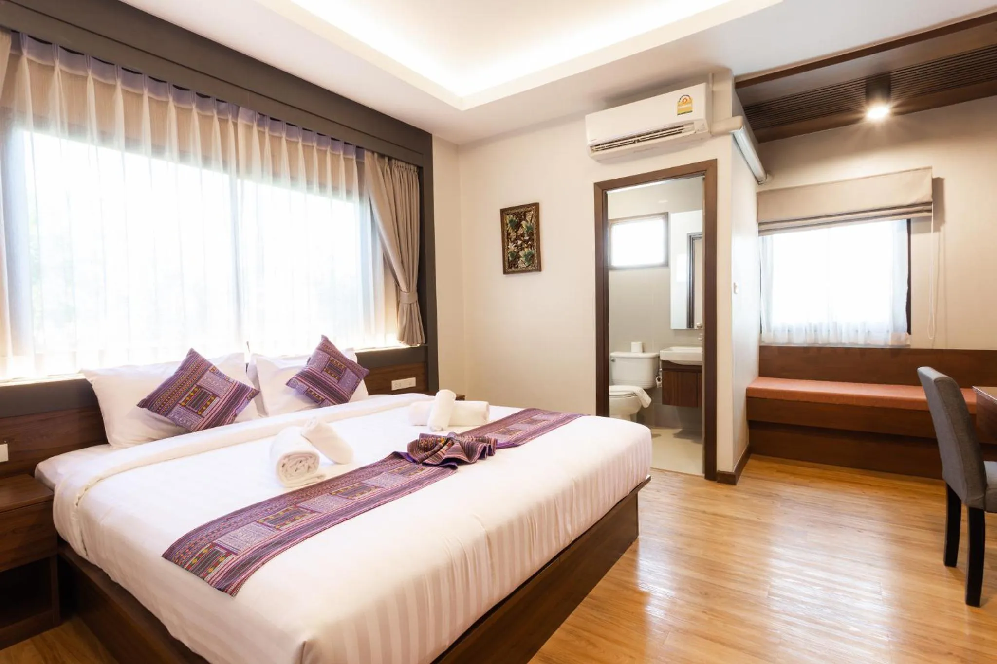 Bed in Lima Lanna Hotel