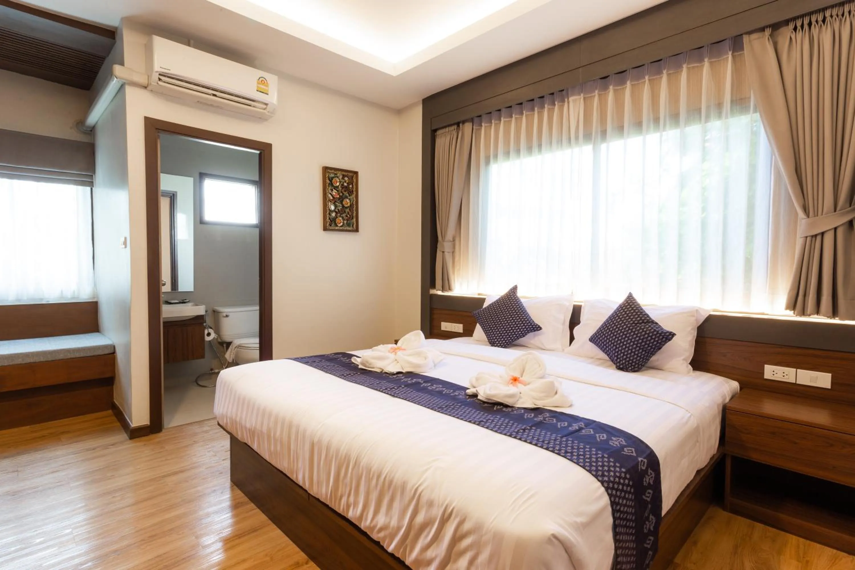 Bed in Lima Lanna Hotel