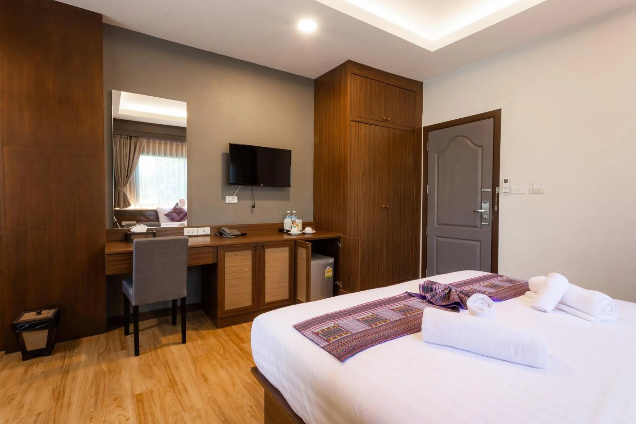 Bed in Lima Lanna Hotel