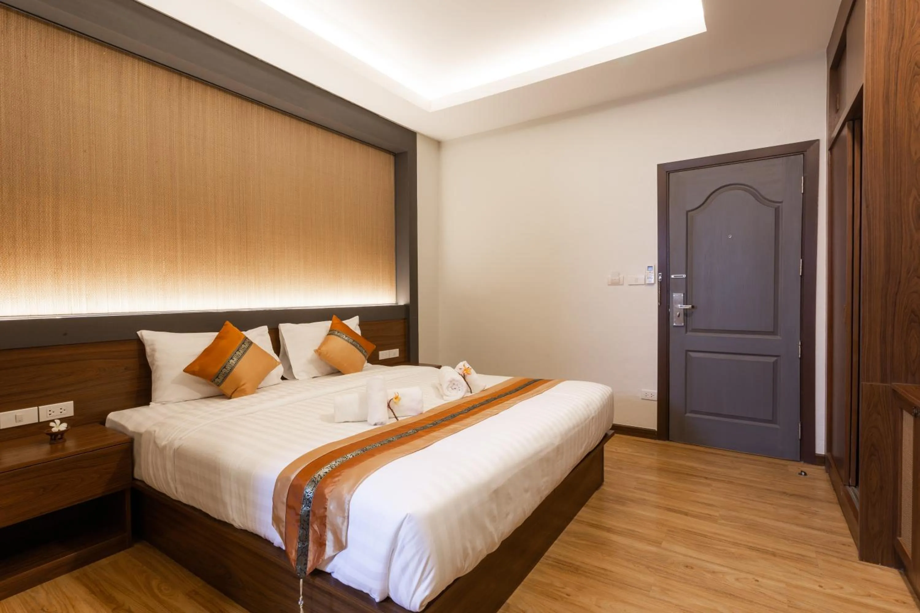 Bed in Lima Lanna Hotel