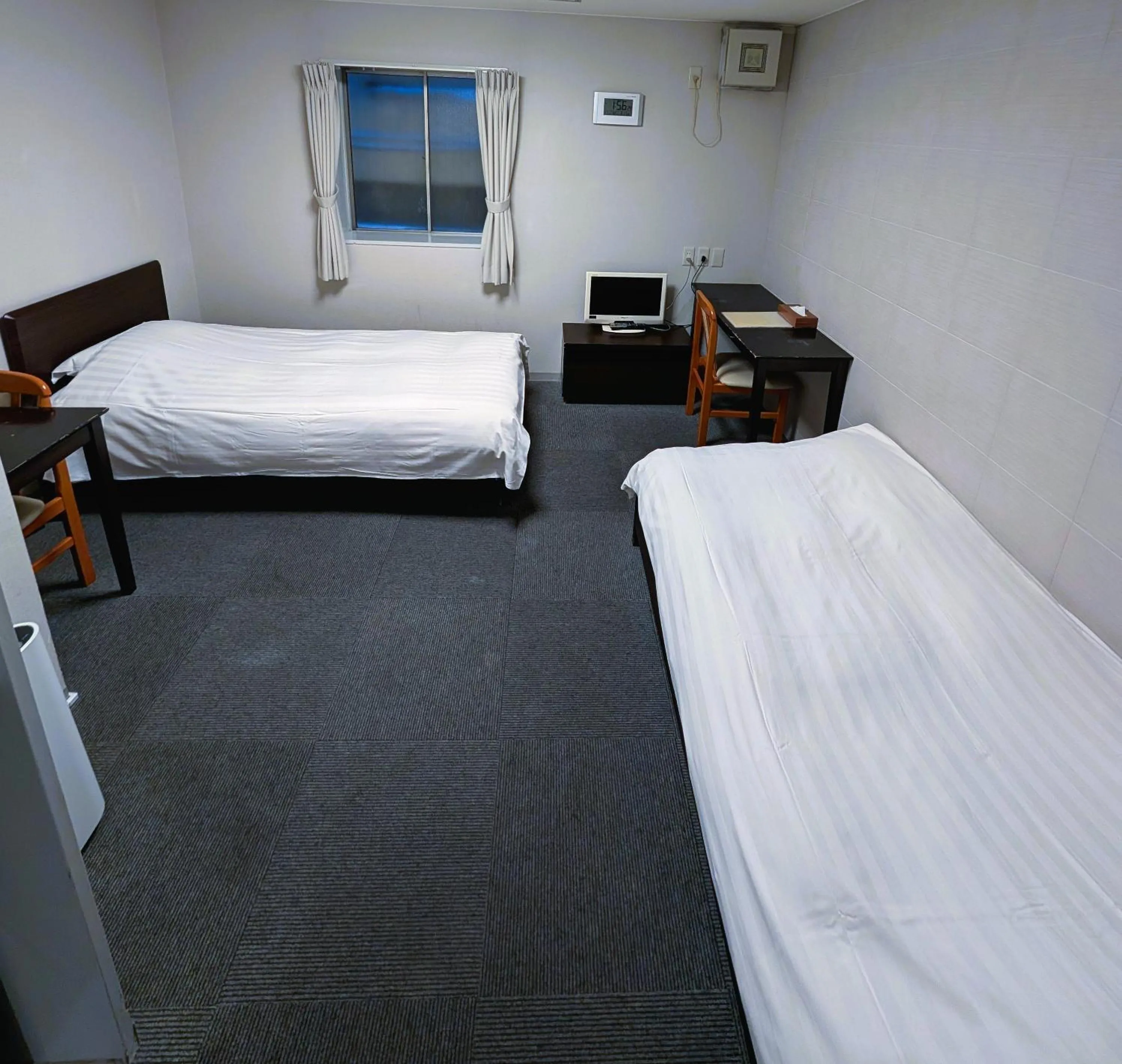 Bed in The Shin-Okubo International Hotel